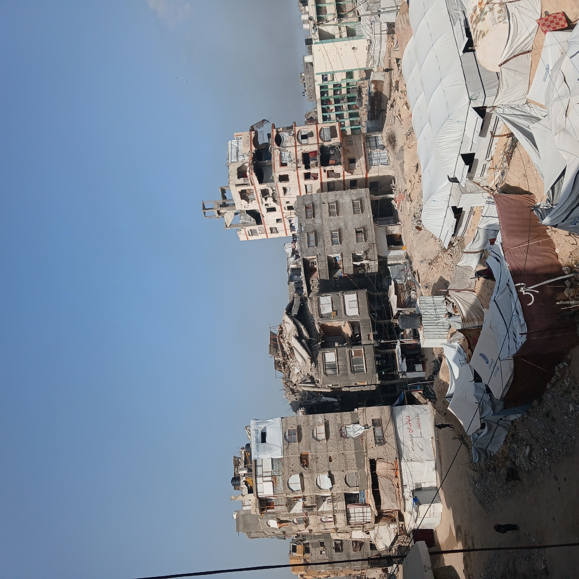 Gaza City shows extensive destruction with refugee camps among ruins