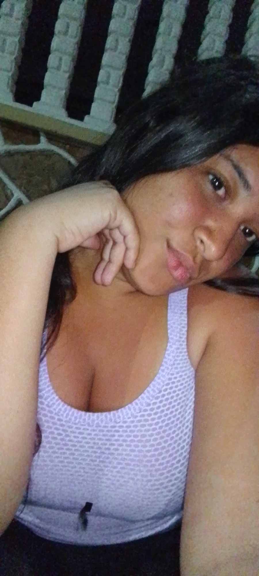 Woman takes selfie in La Cabrera, Venezuela