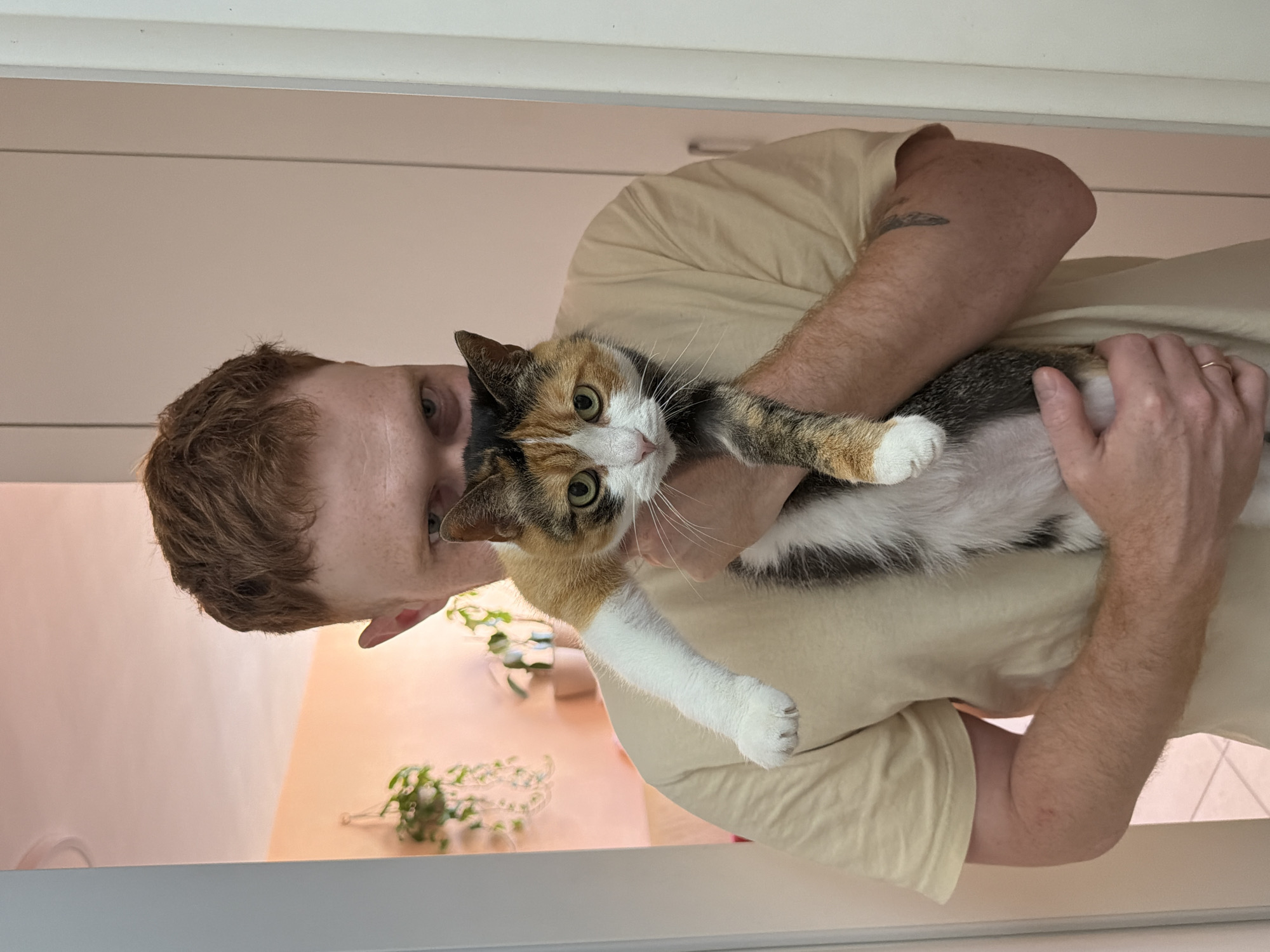 Tel Aviv resident documented during quiet morning routine with cat