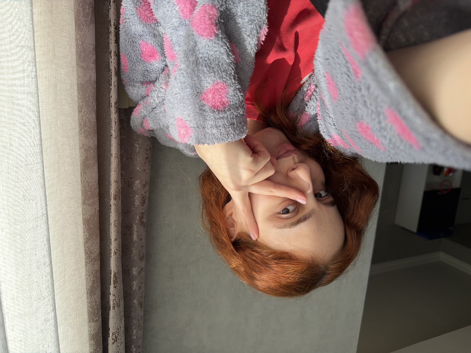 Woman photographed in casual indoor setting in Tbilisi