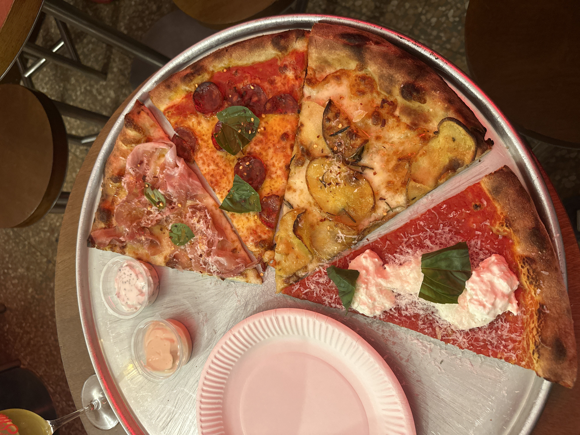 Pizza dinner documented in Milan Sunday evening