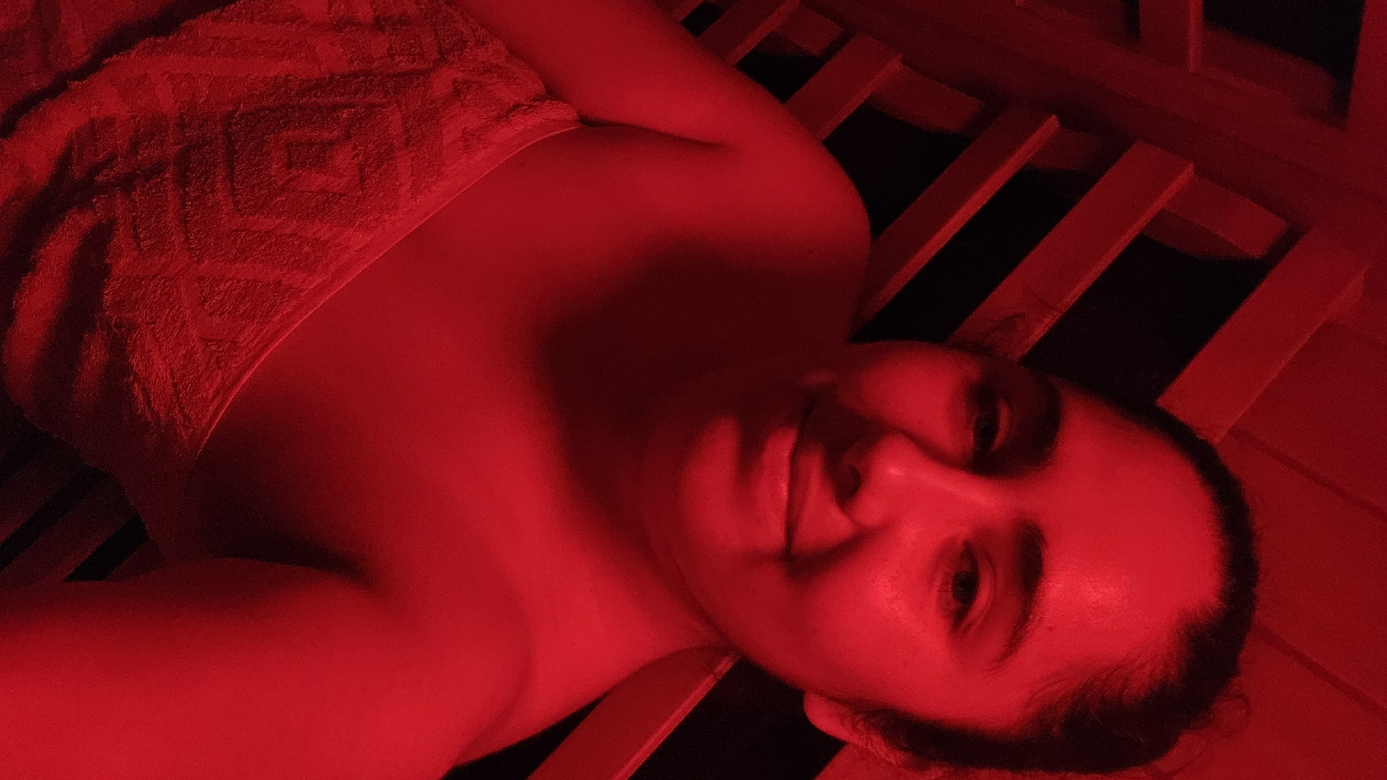 Woman uses red-light sauna therapy in Puebla, Mexico