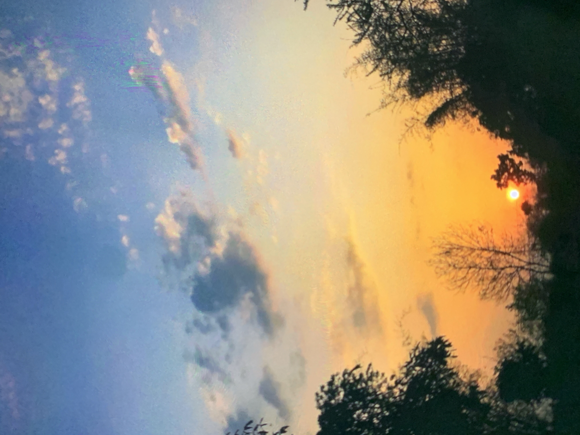 Vibrant sunset displays dramatic colors over Dar es-Salaam skyline