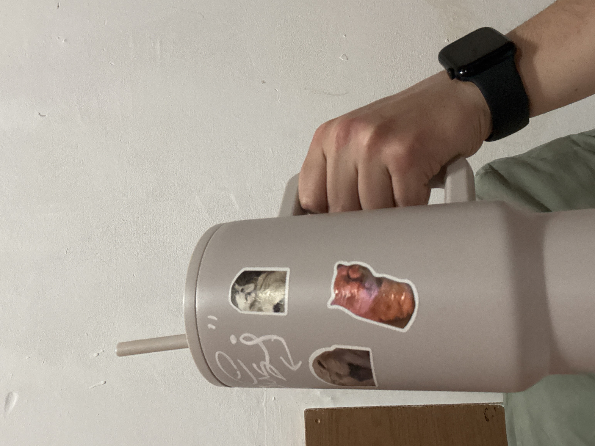 Person holds decorated tumbler in Kazanlak, Bulgaria