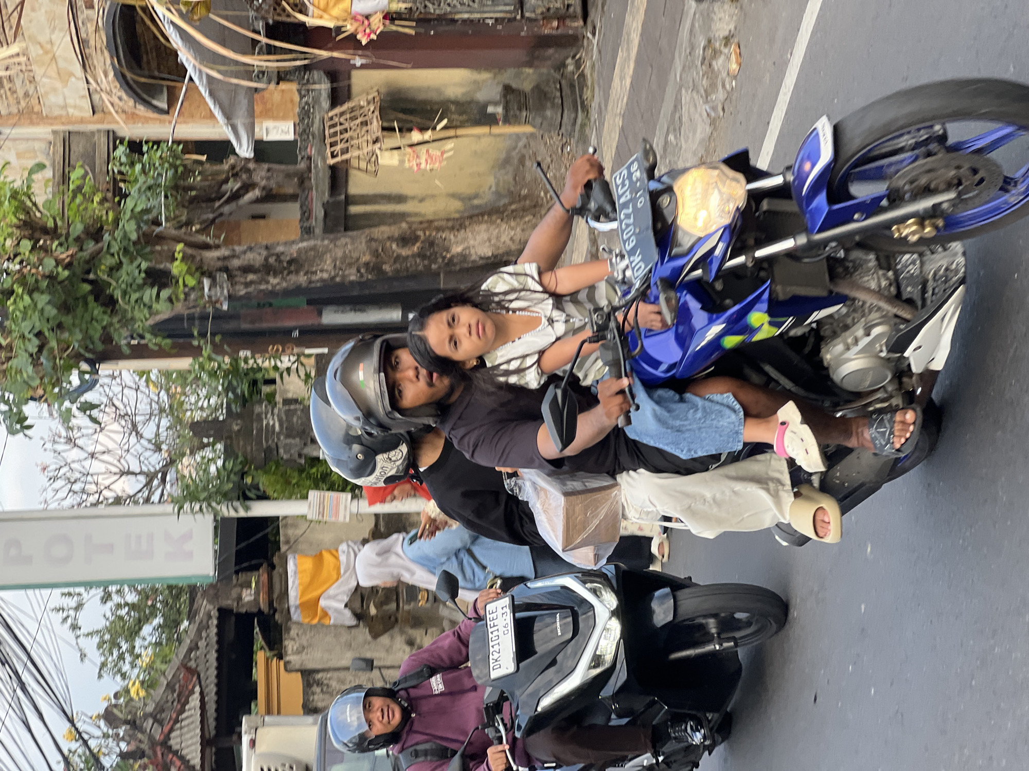 Everyday street life on a busy Denpasar road