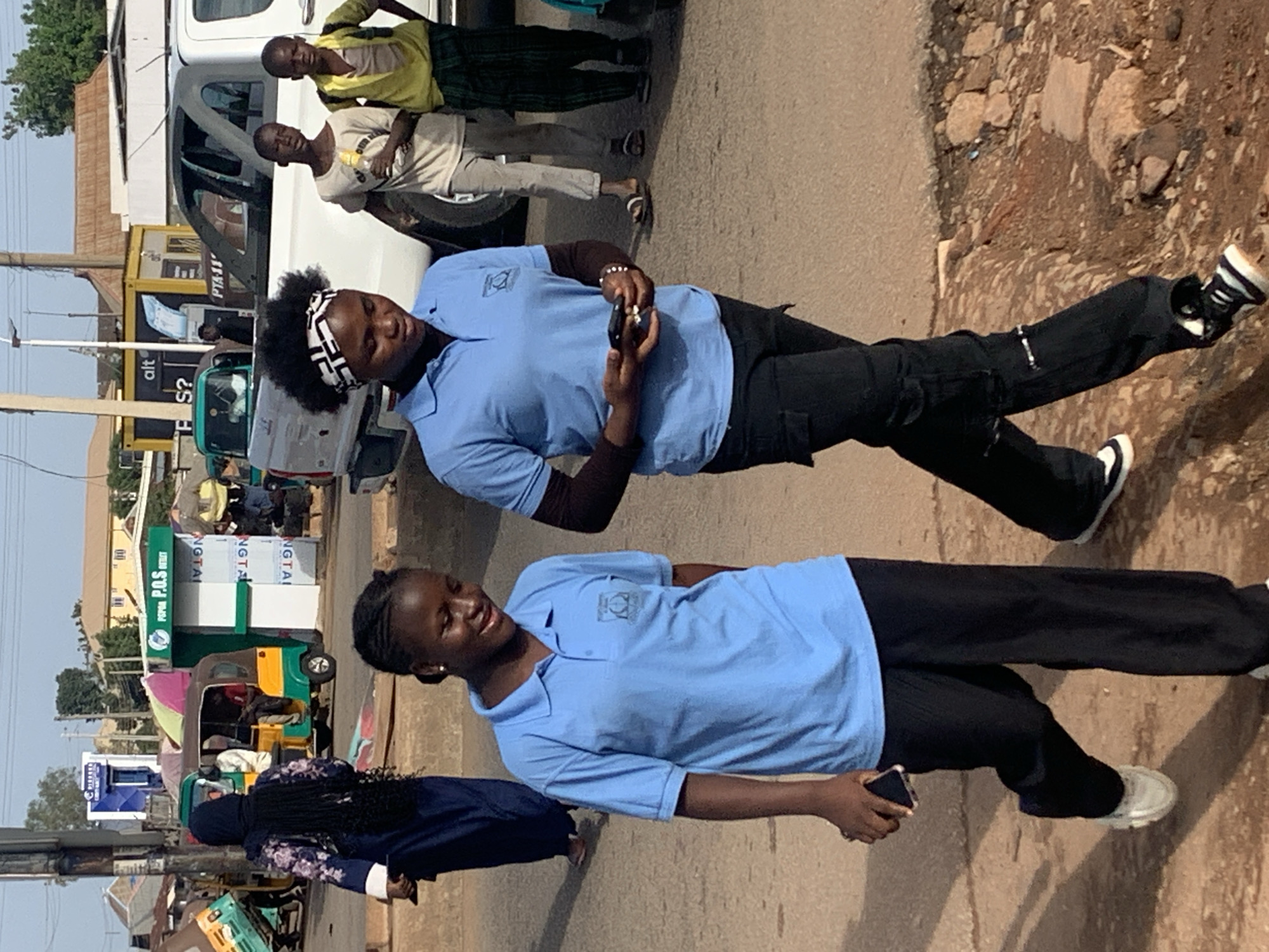 Morning foot traffic and daily errands in Gura Top, Nigeria