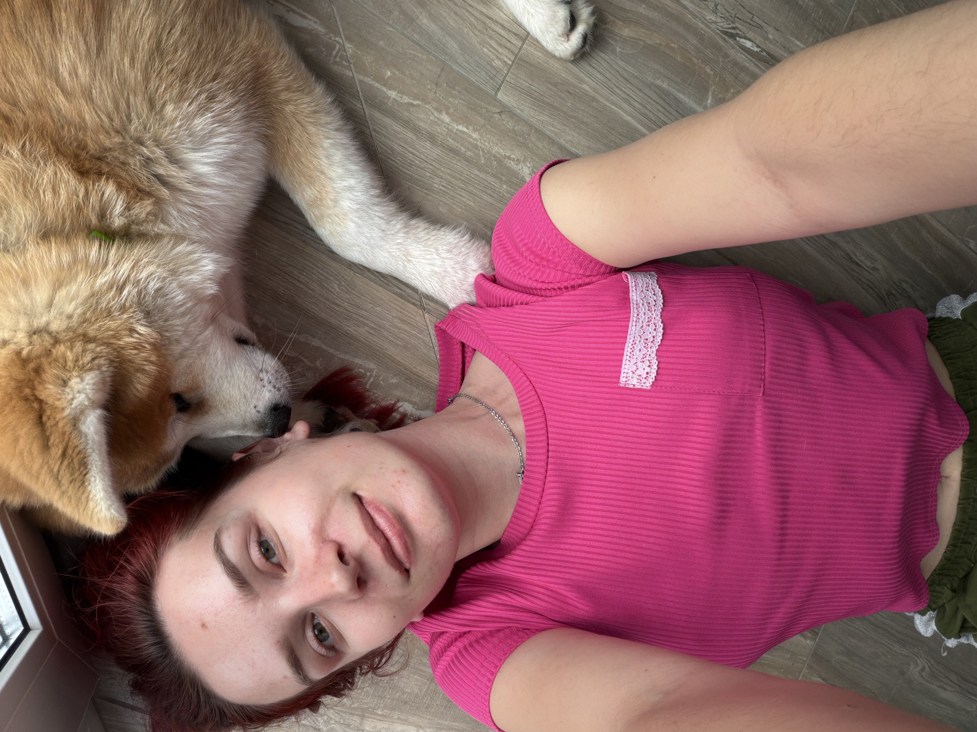 Woman and dog share quiet morning moments in Chaikovsky