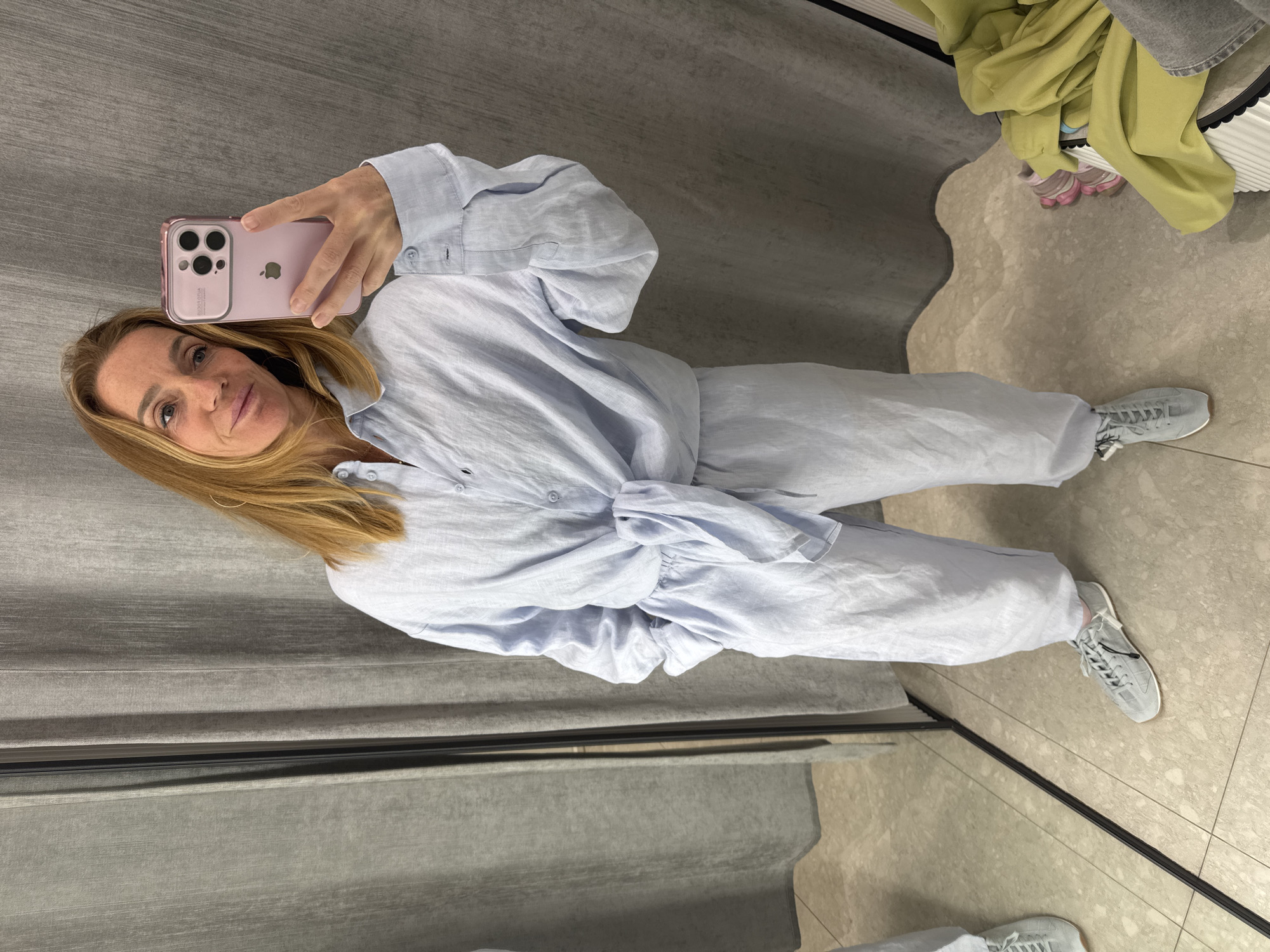 Woman shopping, taking selfies in Saint Petersburg retail locations