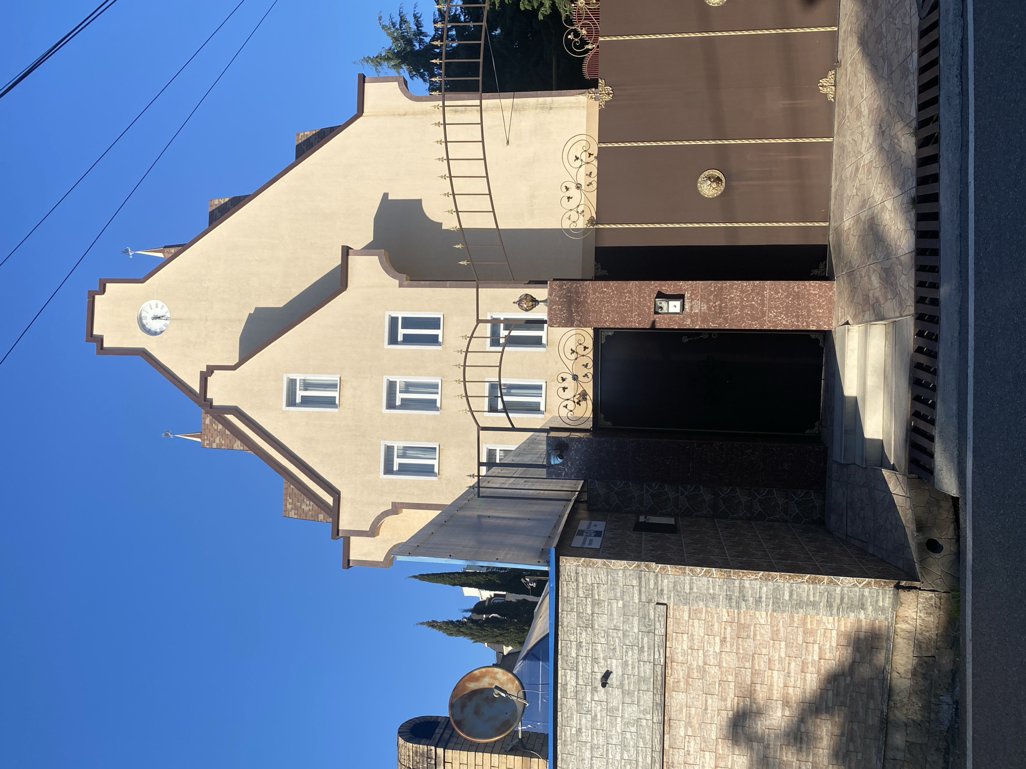 Sunny residential streets documented in Sochi hillside neighborhood
