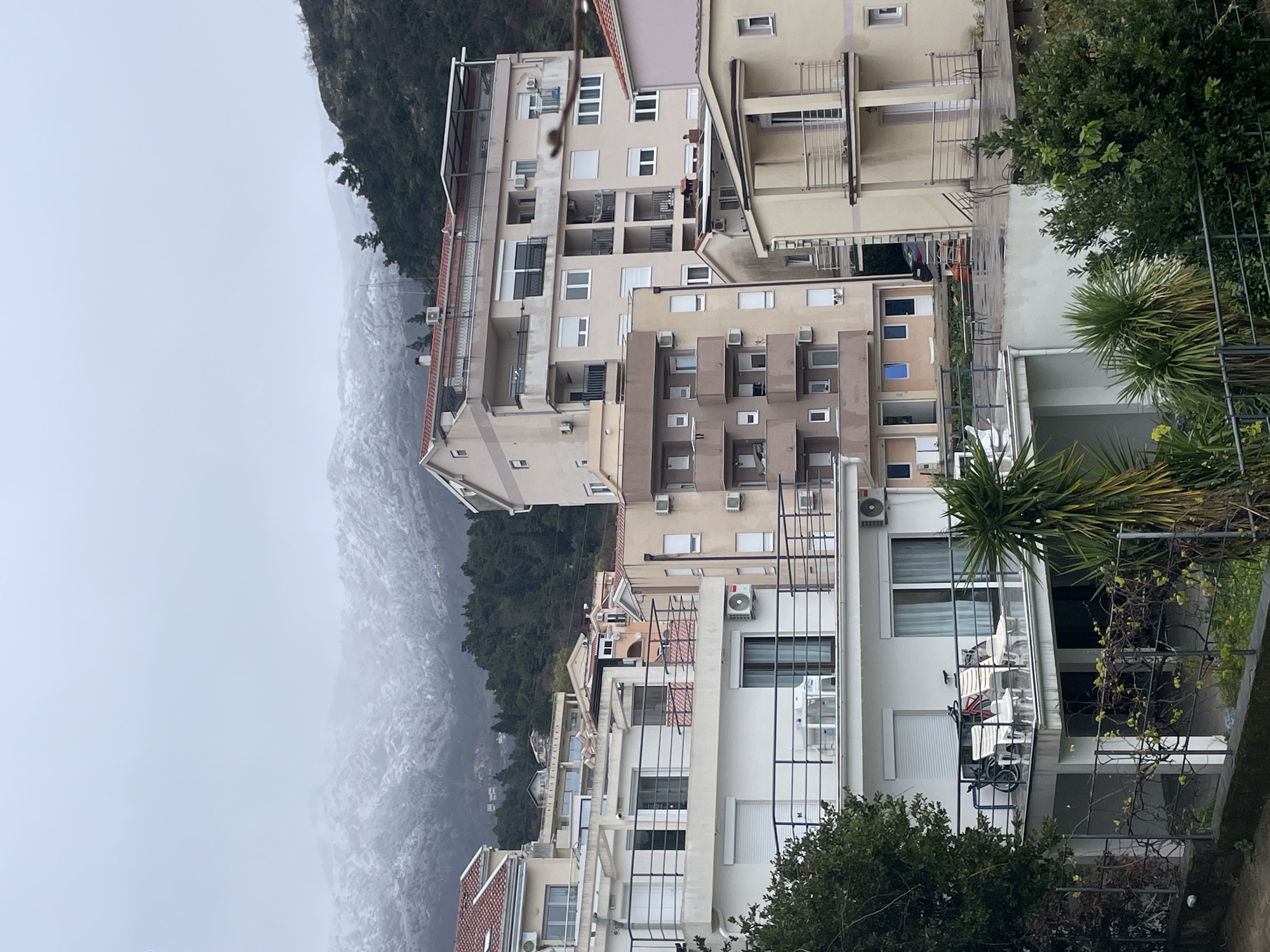 Morning snapshots capture daily life in overcast Budva