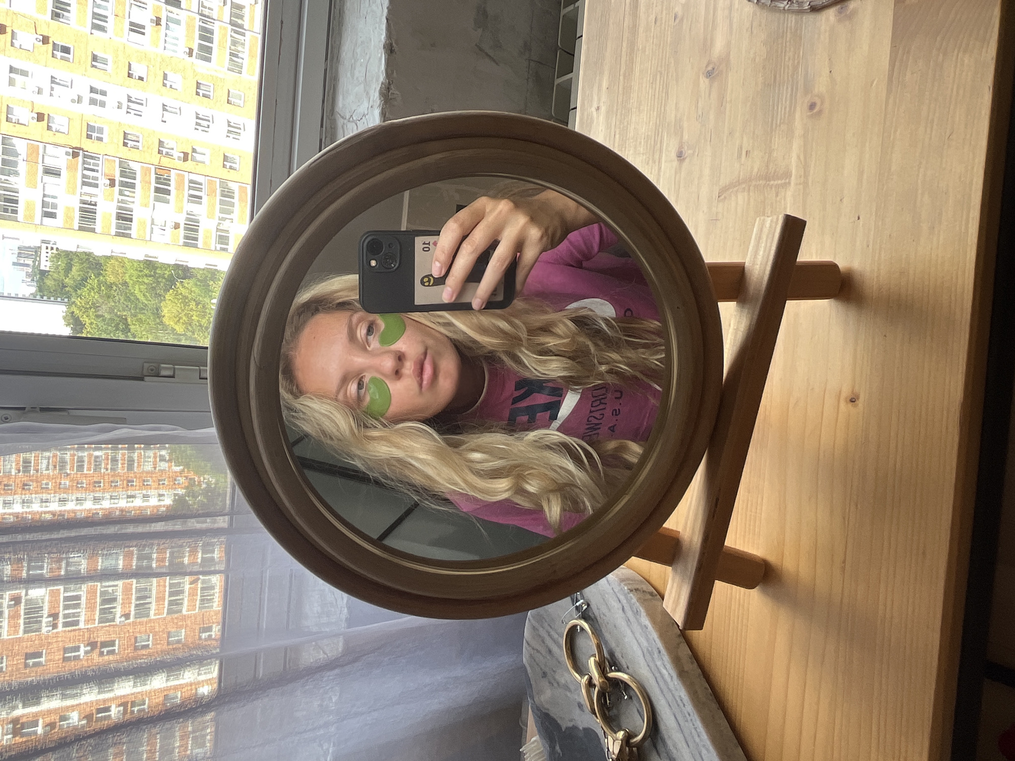 Morning skincare moment captured in a Khimki apartment mirror
