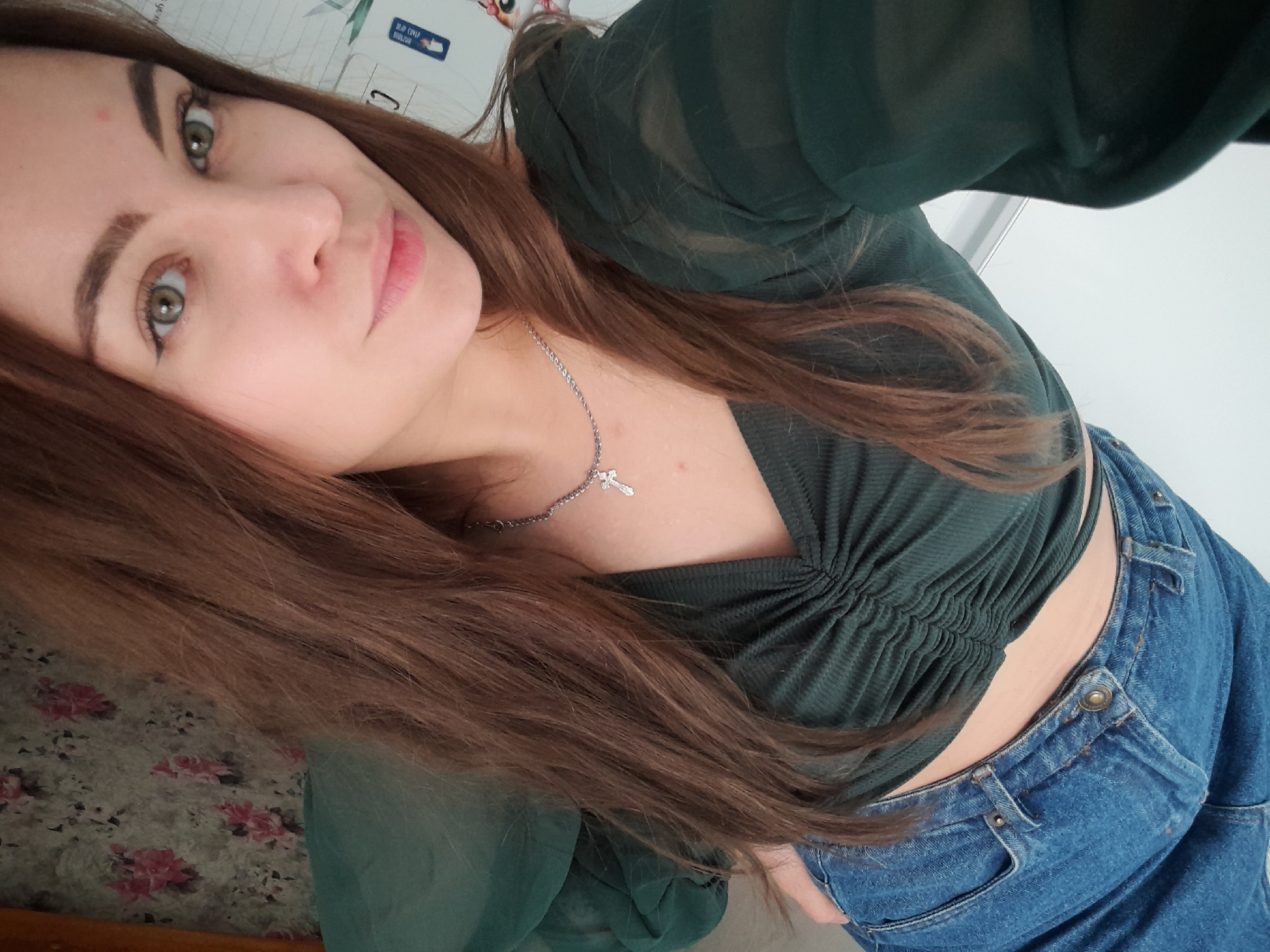 Woman in green shirt photographed multiple times over seven minutes