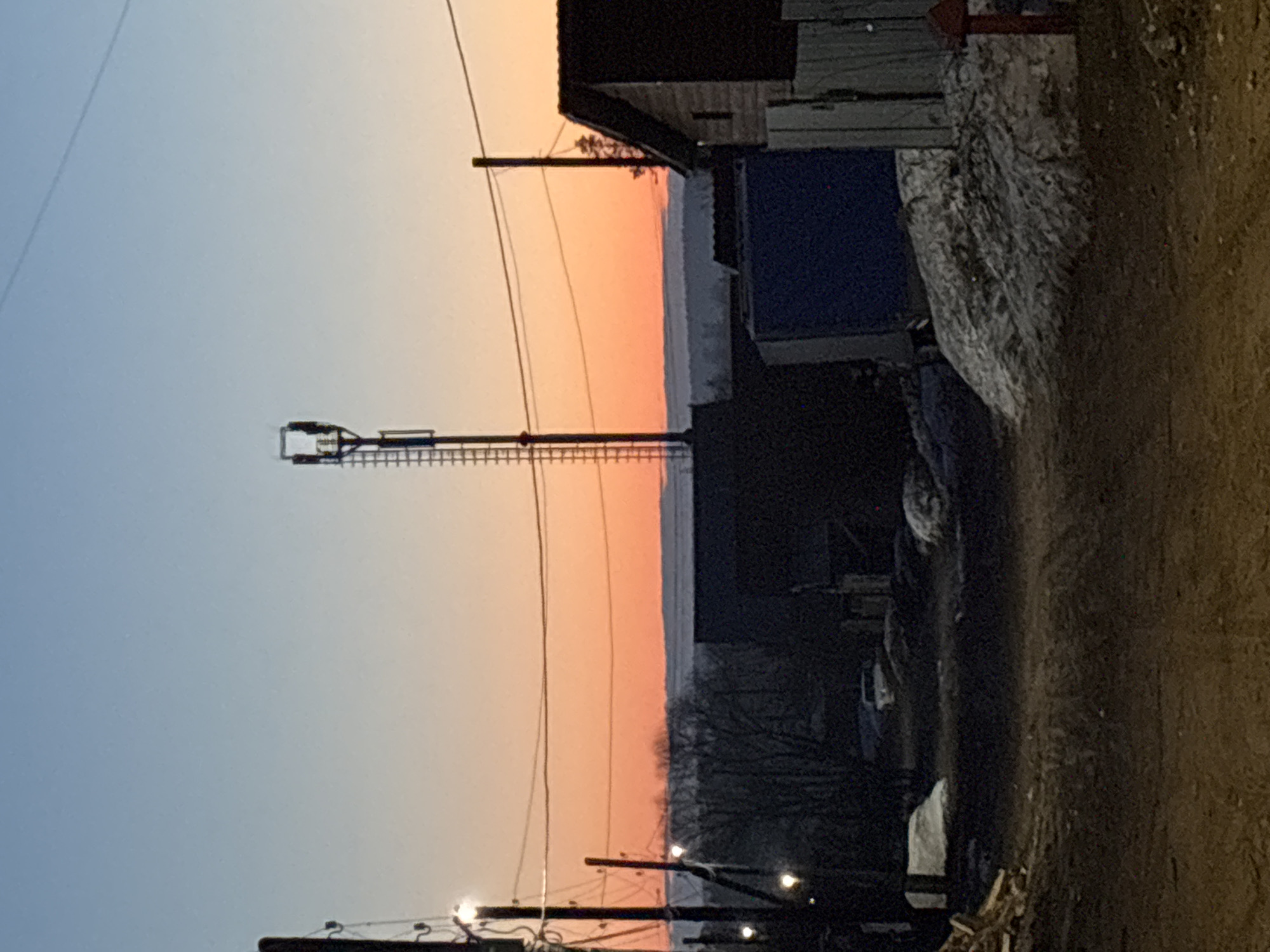 Sunset documented across Chaikovsky streets during April evening