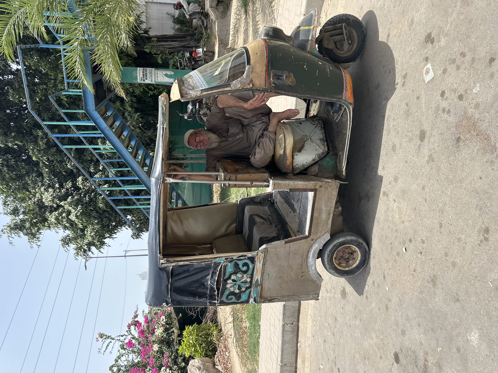 Everyday street scenes from a Karachi neighborhood