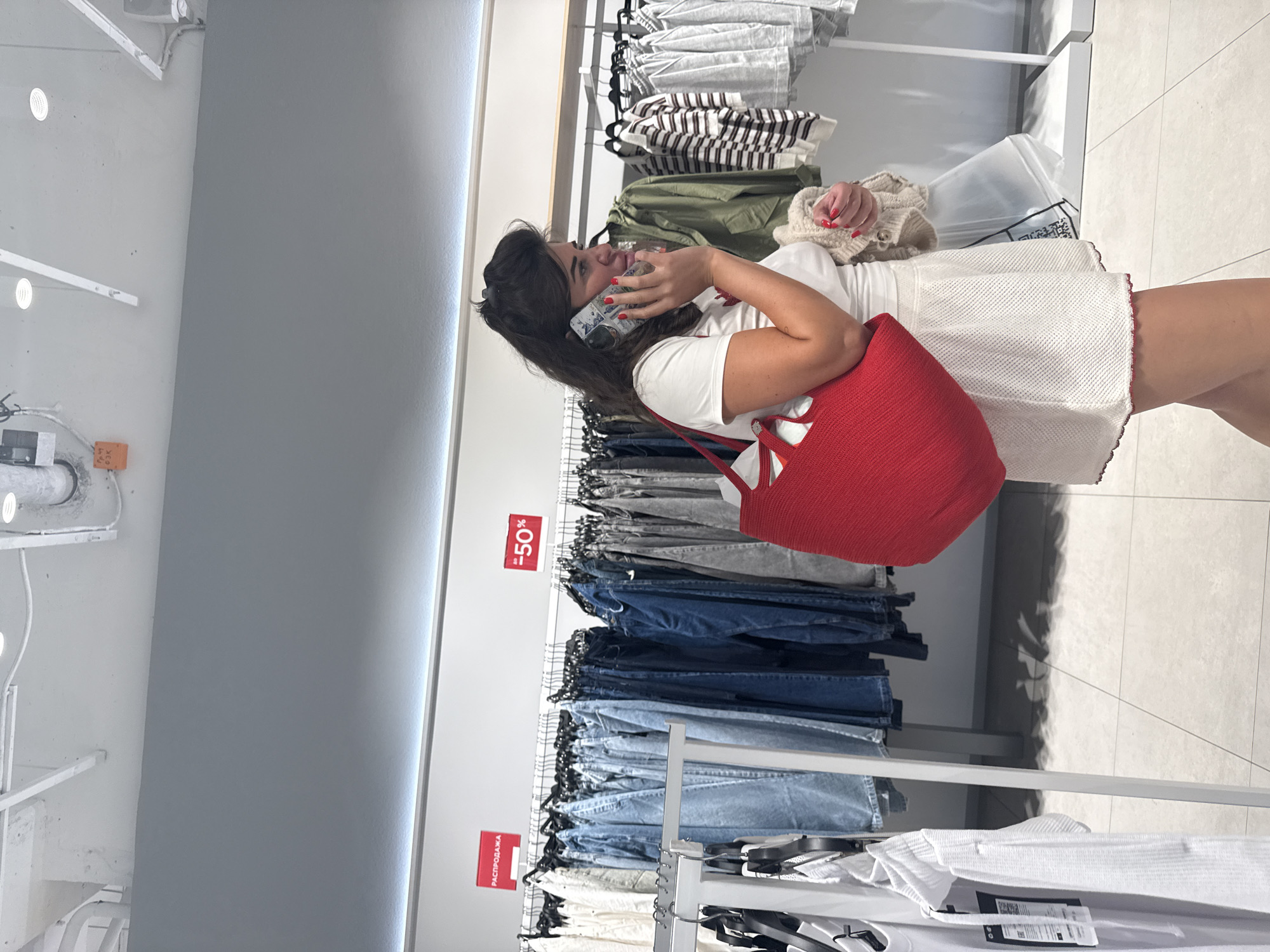 Browsing clothing and accessories at a Zarina store in Ukraine