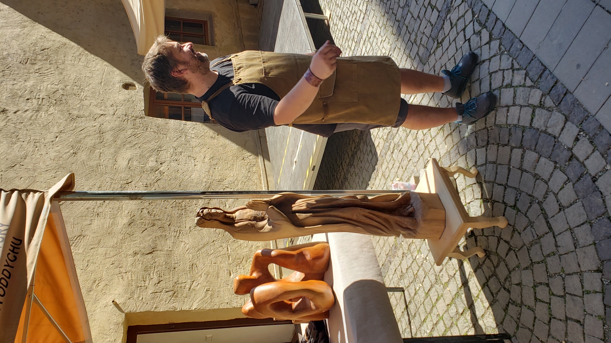 Prešov old town: craft market, street performers, and campaign vehicle