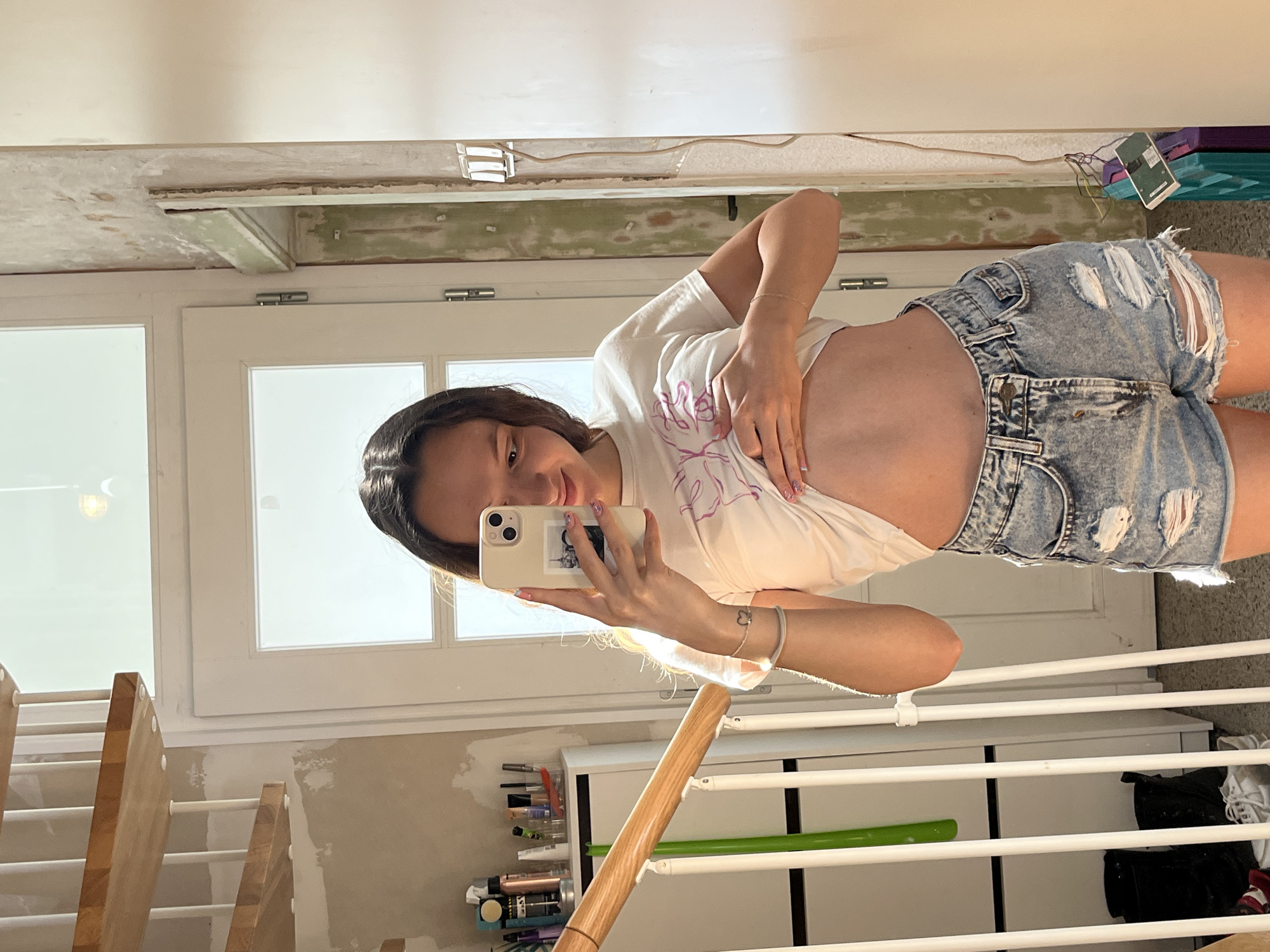 Woman takes selfies in renovation space, Saarbrücken