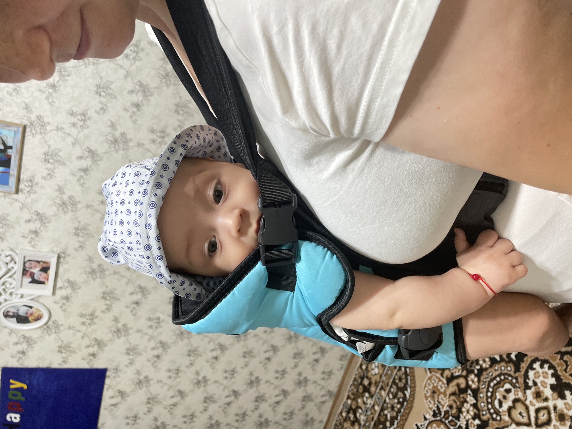 Curious baby in a bucket hat, out in Fălești
