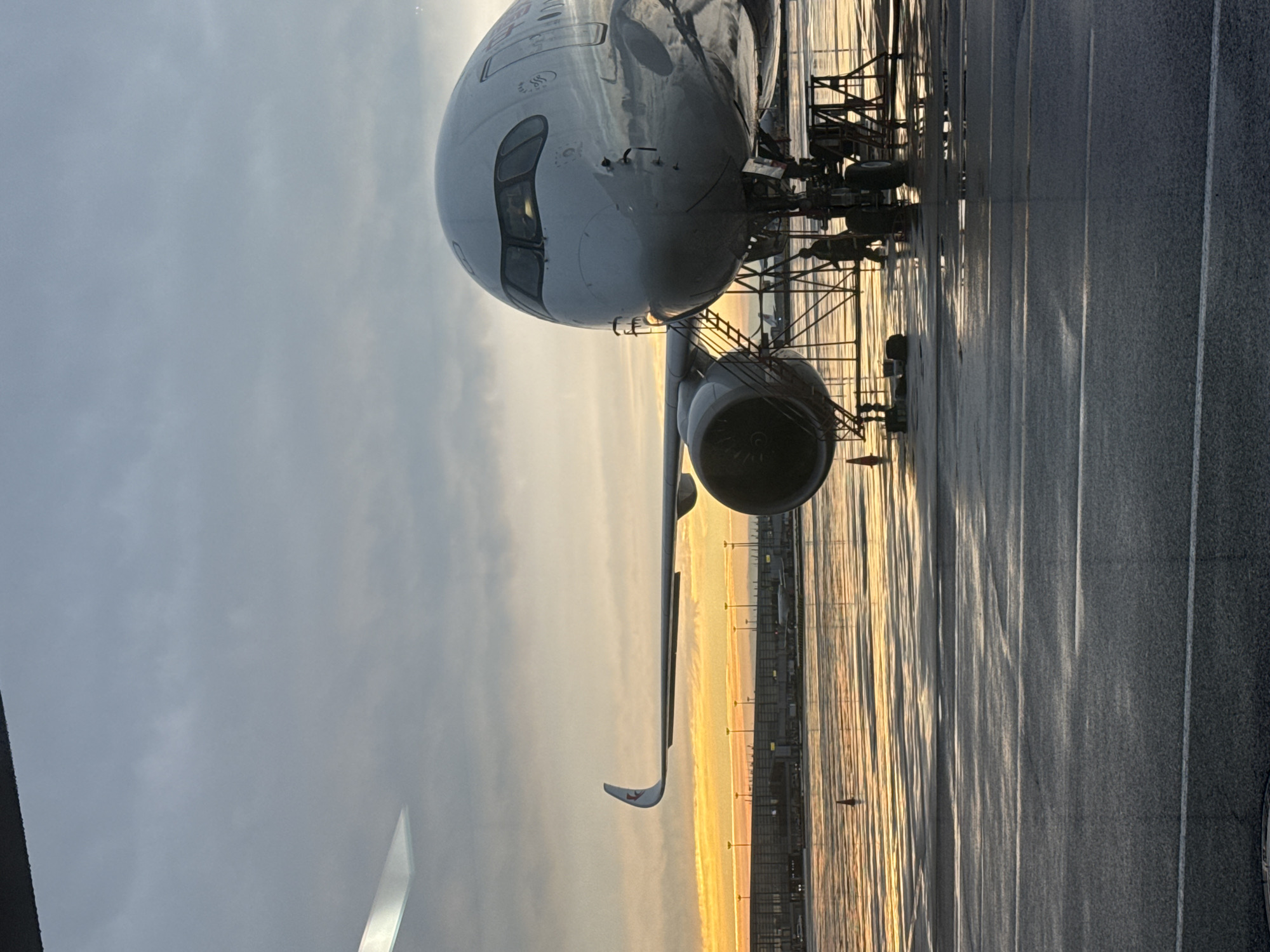 Rainy evening at Pudong Airport, tarmac and security checkpoint