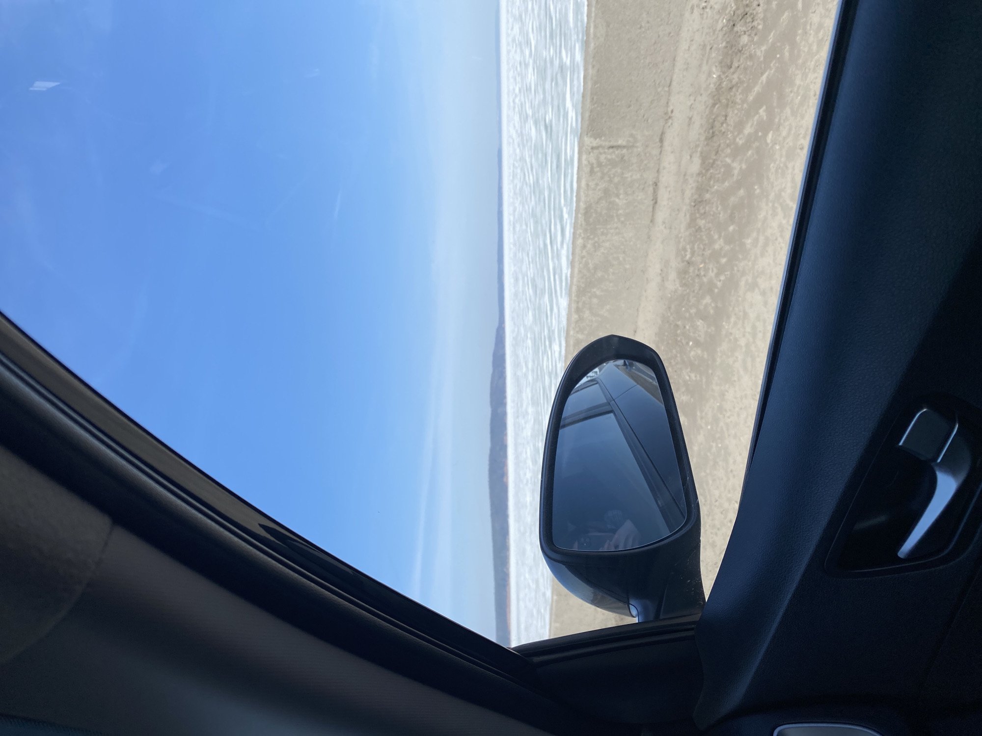 Morning highway drive in Chaikovsky captures road maintenance scene