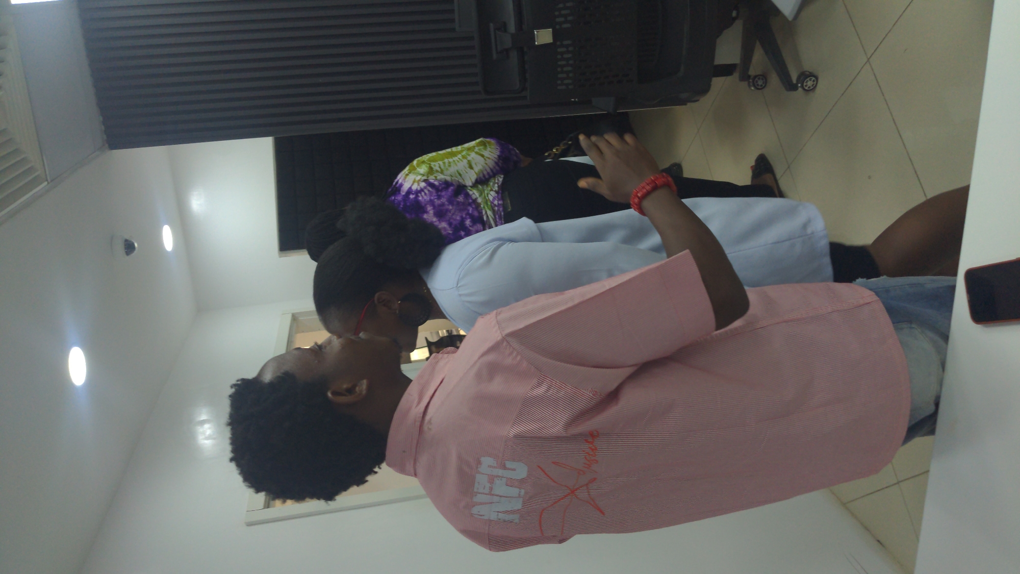 Office gathering documented in Abuja workspace