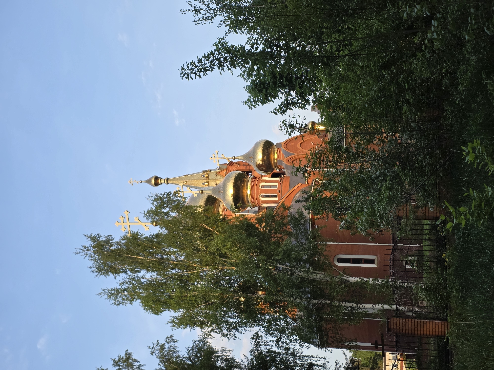 Sunset scenes captured around Orthodox church in Chaikovsky, Russia
