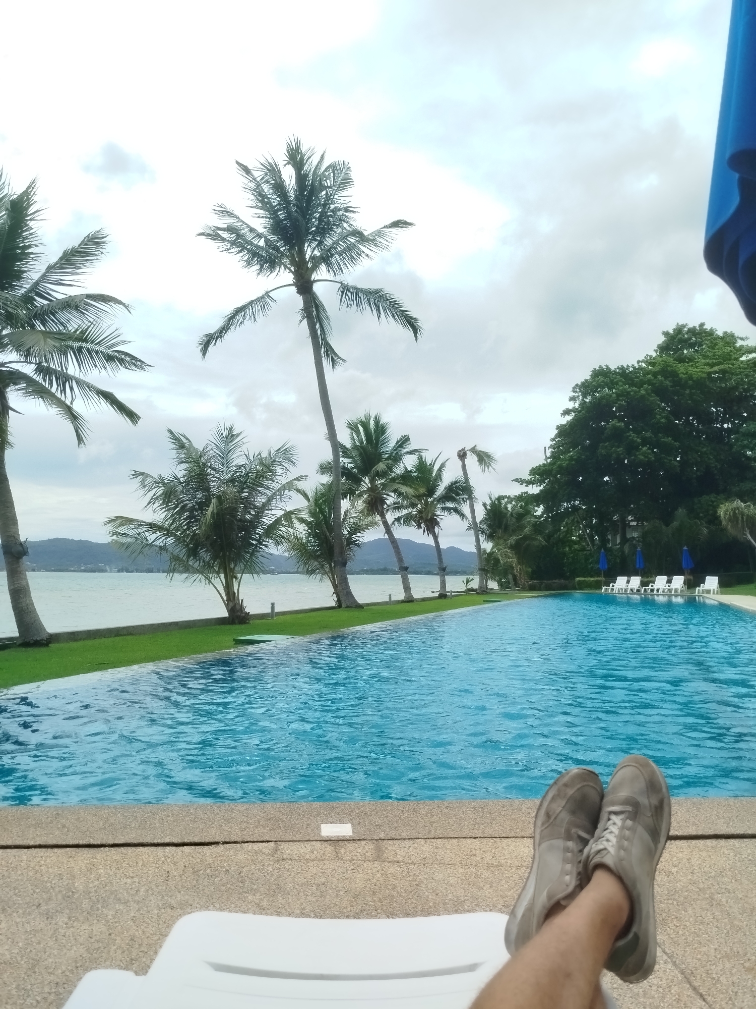 Infinity pool and beach views at a Wichit resort