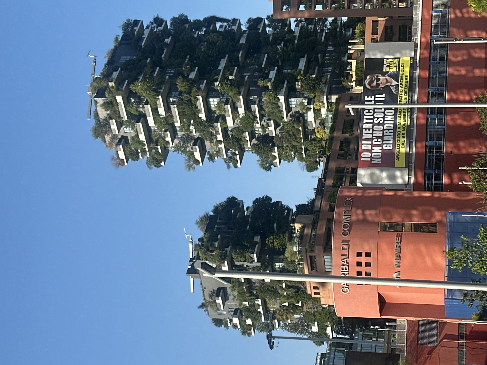 Milan's Porta Nuova district: modern towers and street-level scenes