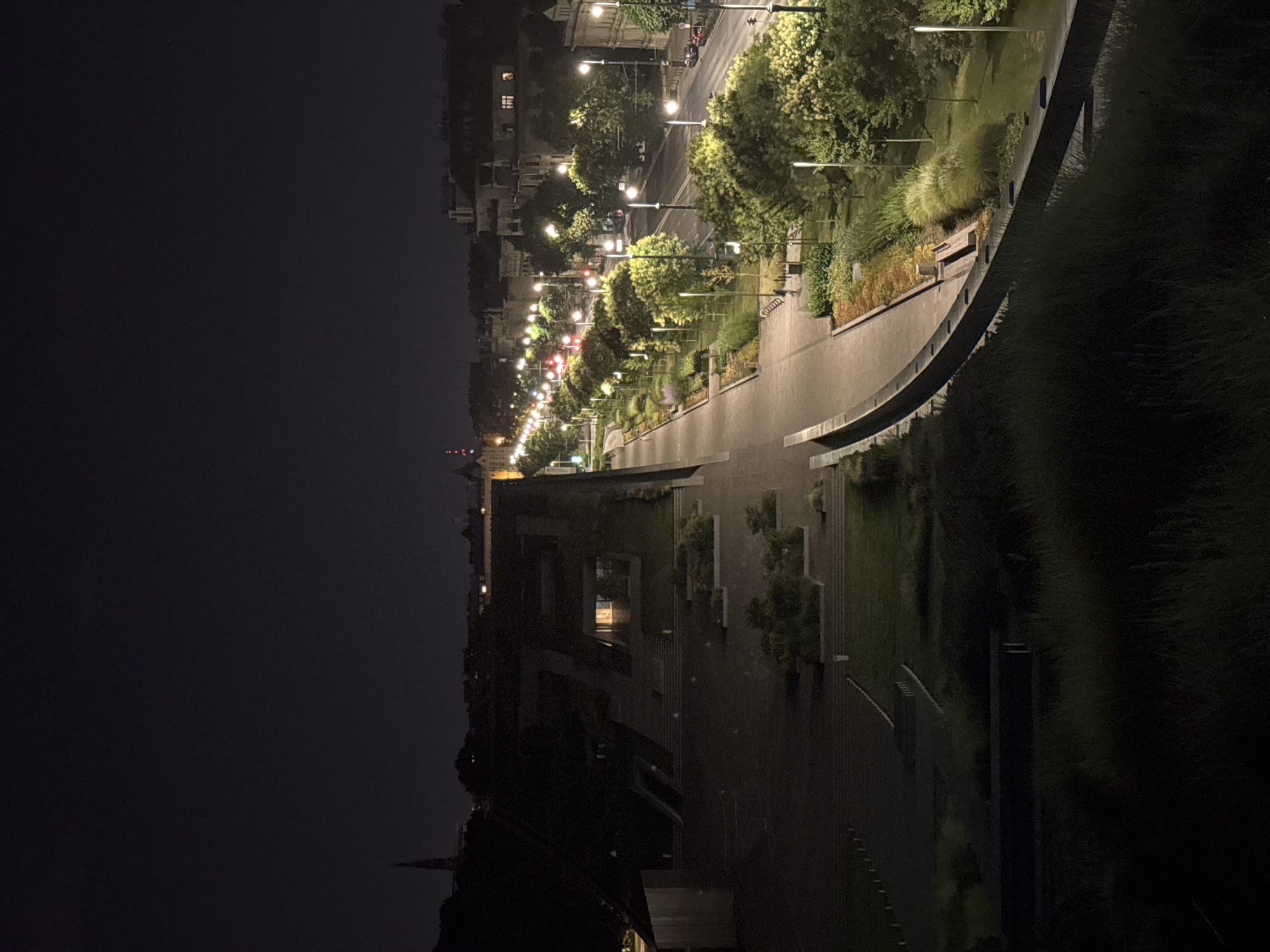 Nighttime city park and street scene, multiple aerial angles
