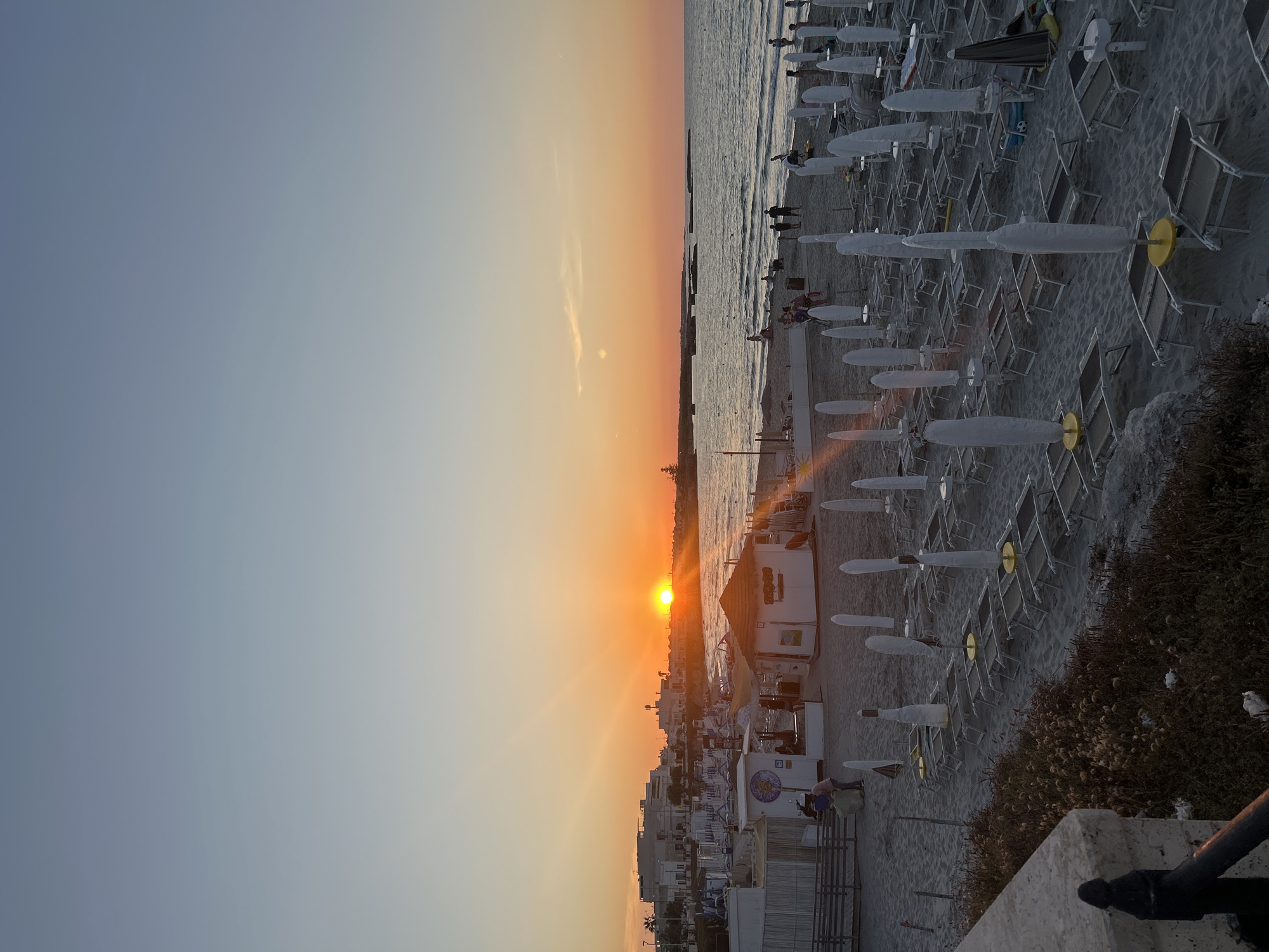 San Foca beach at golden hour, two perspectives