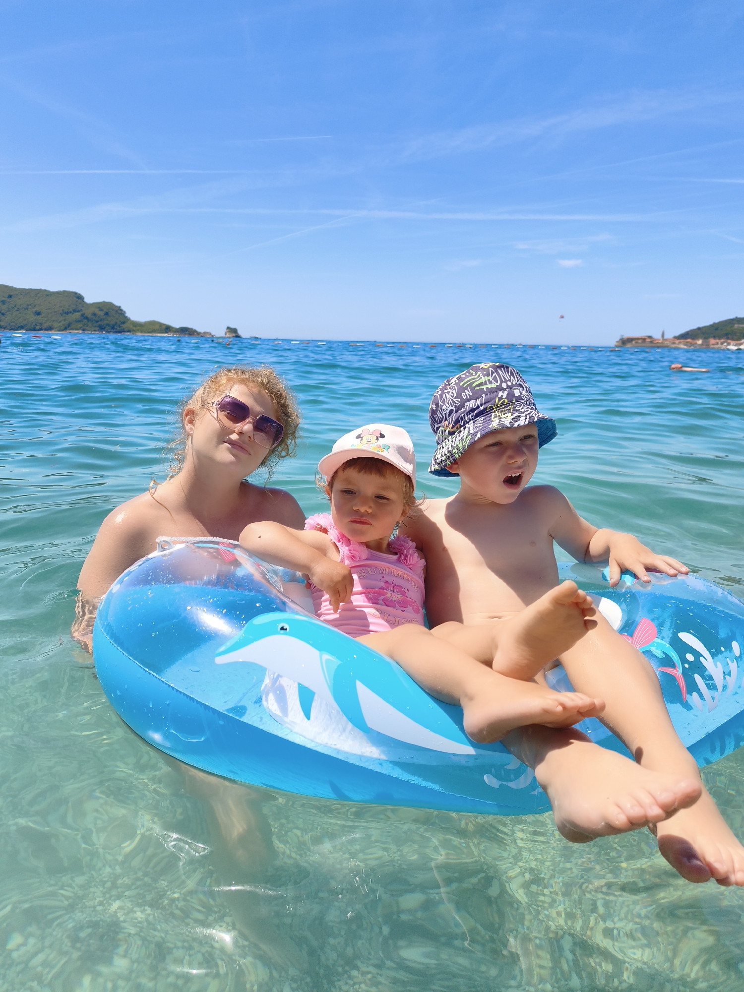 Family enjoys morning beach time in Budva, Montenegro