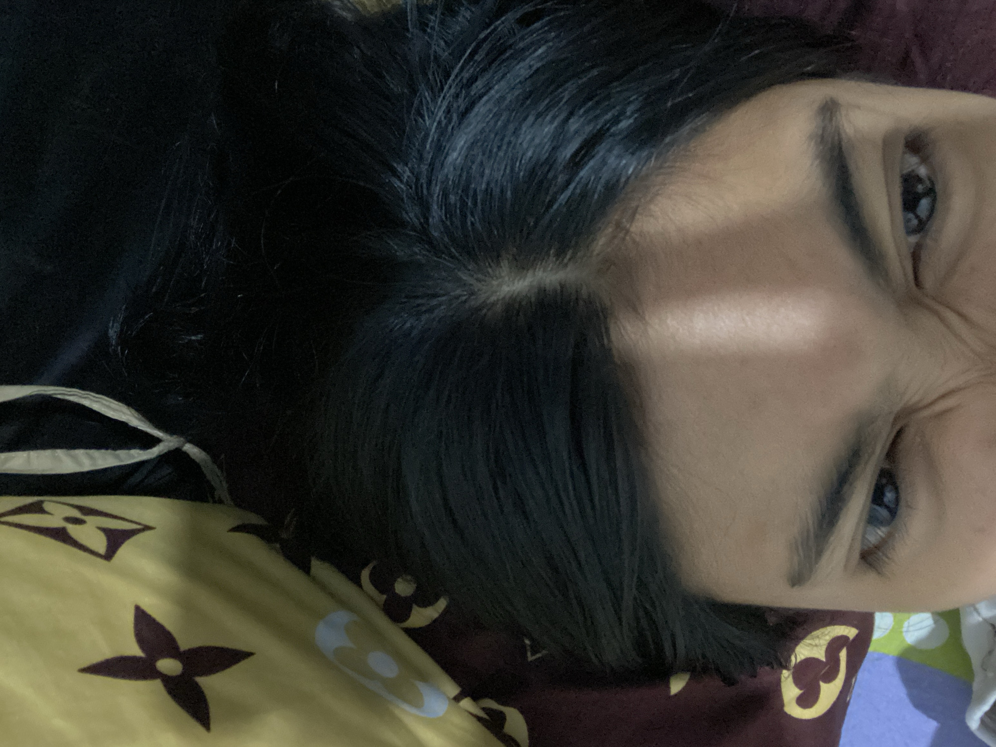 Woman captures personal moments in Madiun bedroom