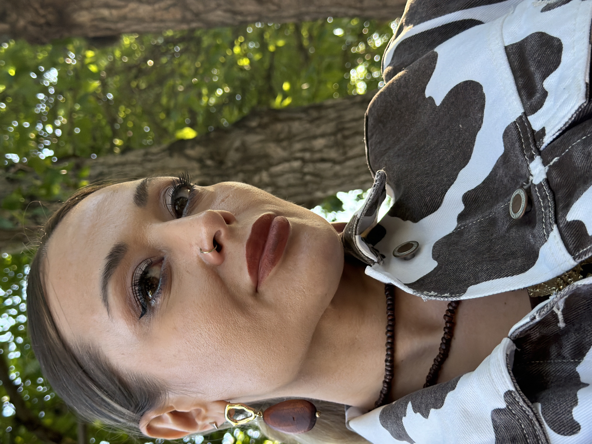 Woman enjoys outdoor photo session in Krasnoyarsk park