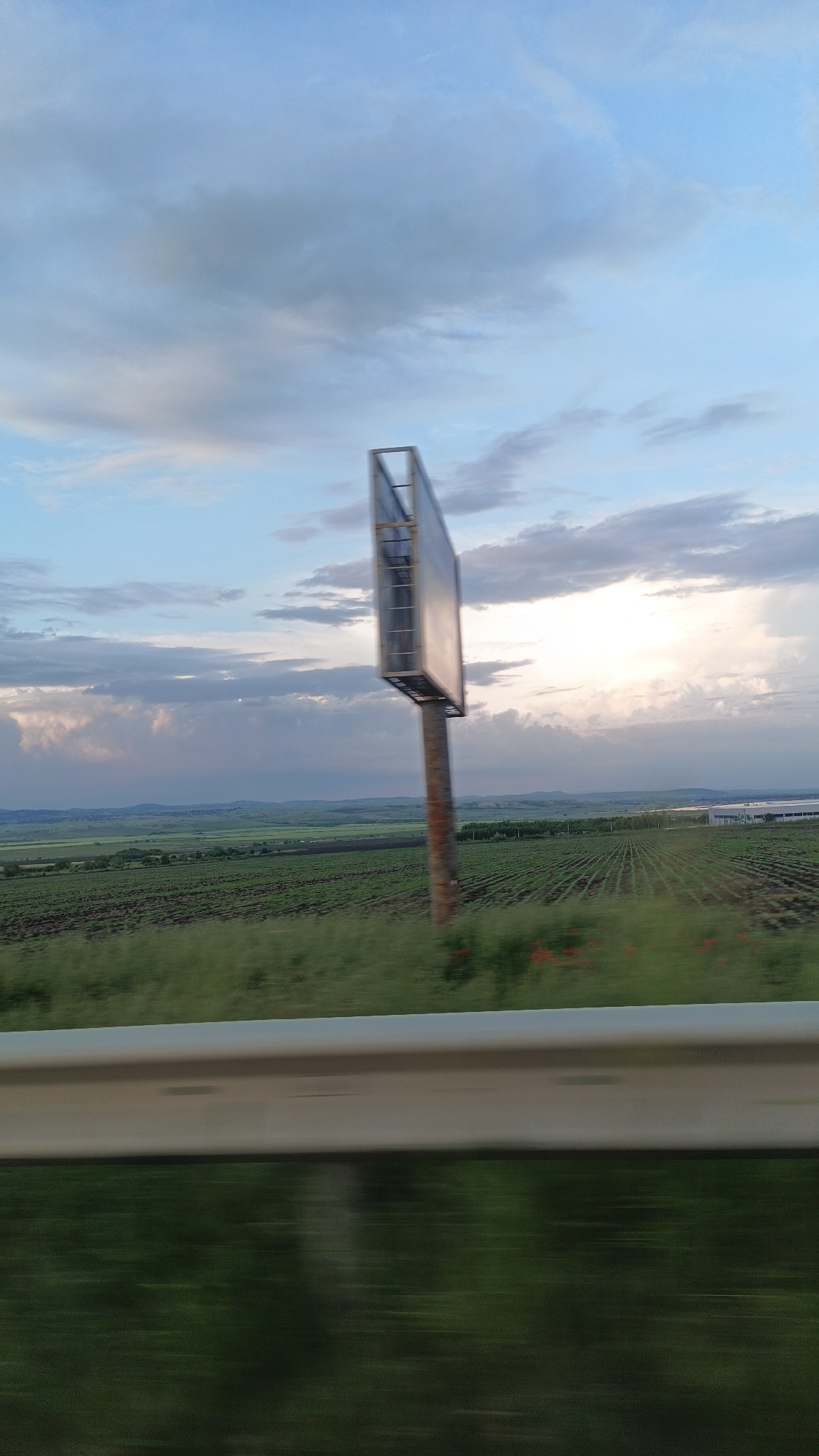 Rural farmland captured from moving vehicle near Burgas, Bulgaria