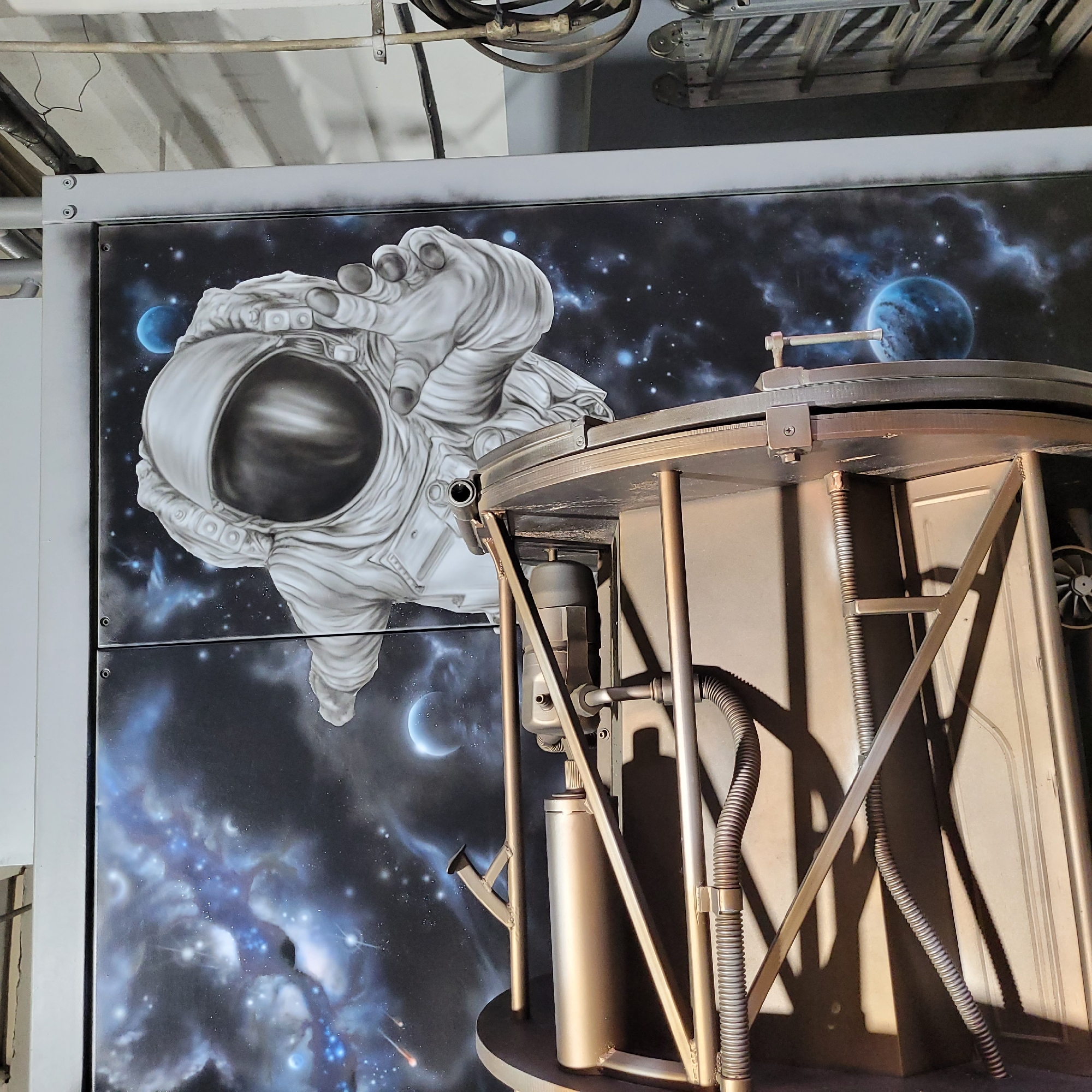 Industrial facility with space murals documented by visitors