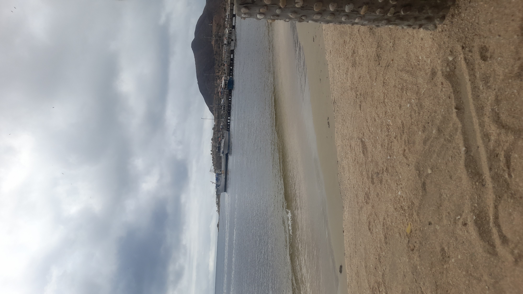 Overcast afternoon exploring Juan Griego harbor and coastline