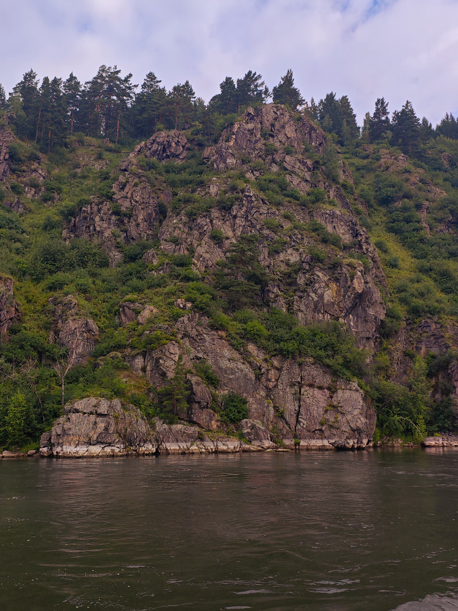 Yenisei River cliffs and morning fog near Atamanovo