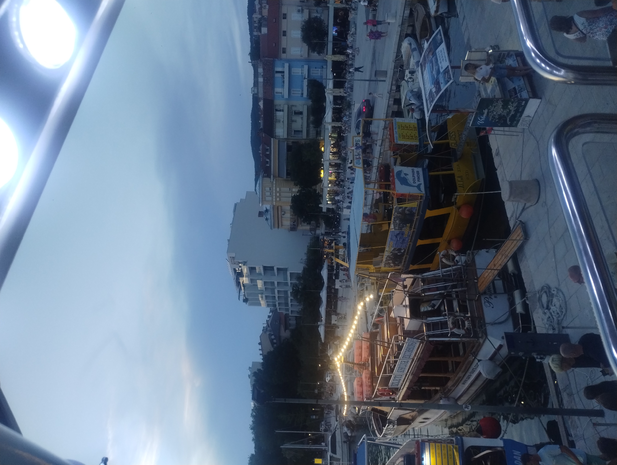 Crikvenica harbor at dusk, boats docked along the Adriatic