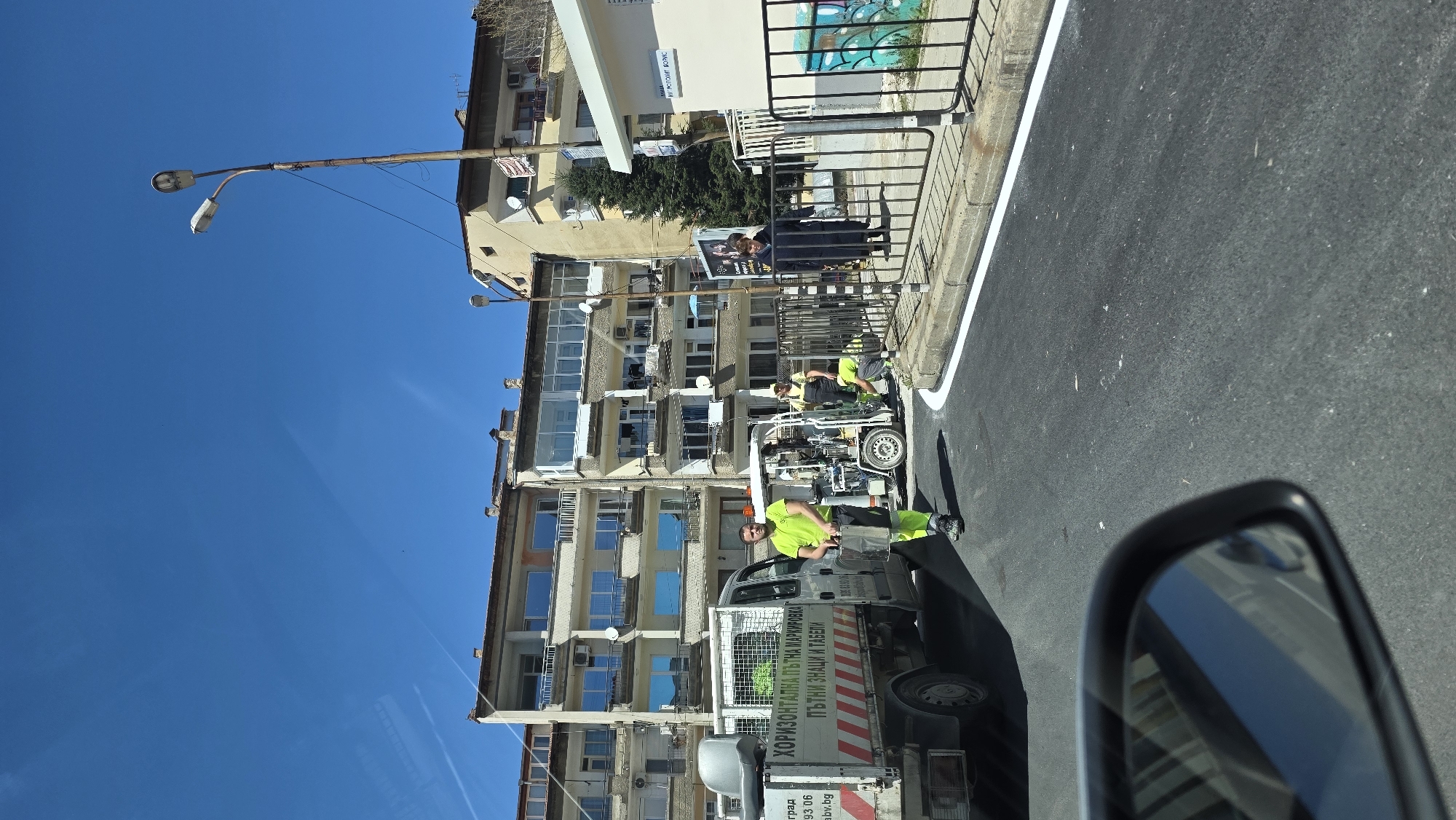 Road marking crew works street maintenance in Blagoevgrad