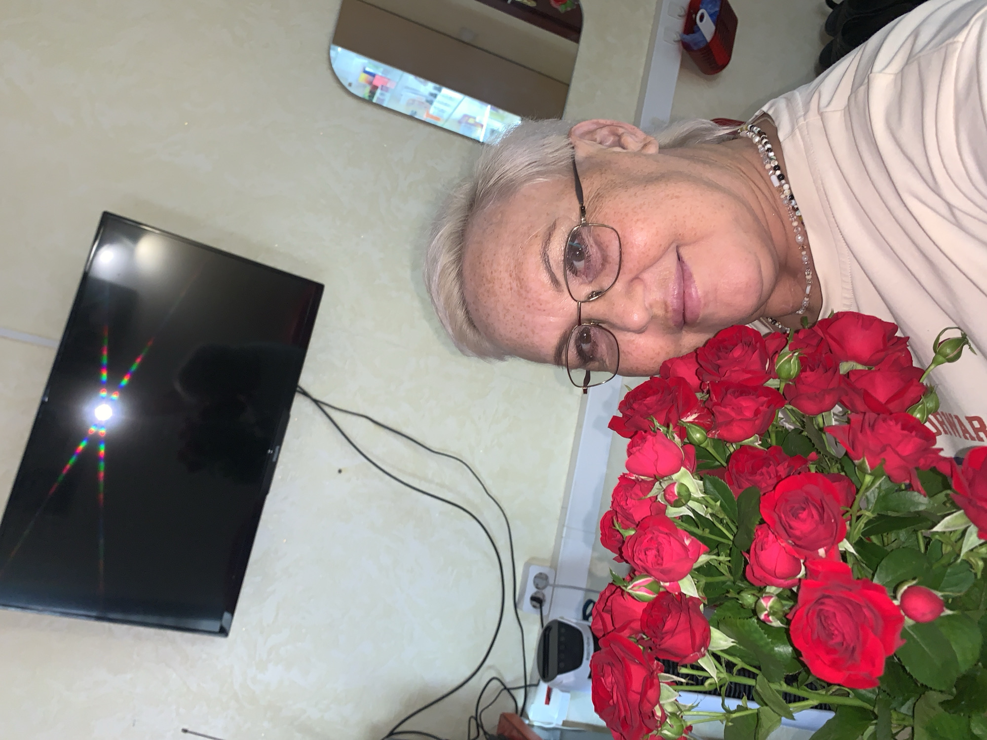 Red roses and selfies in Chaikovsky on a summer morning