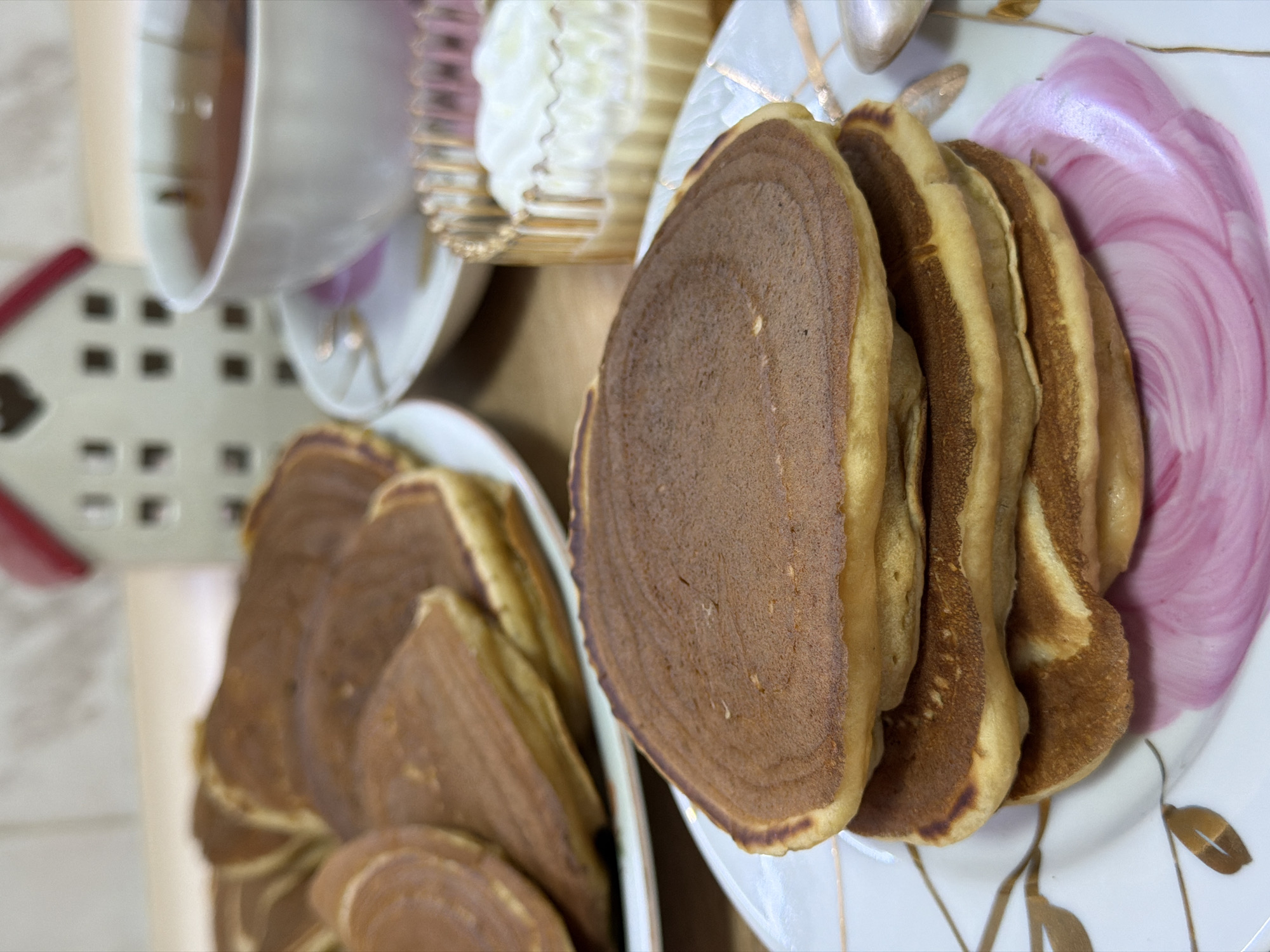 Quiet evening with pancakes, sleeping cat, and TV in Izhevsk