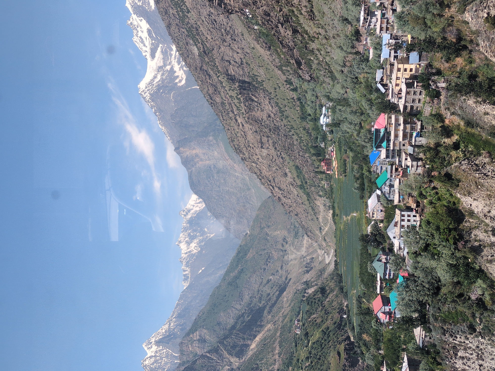 Keylong village nestled in a Himalayan valley below snowy peaks