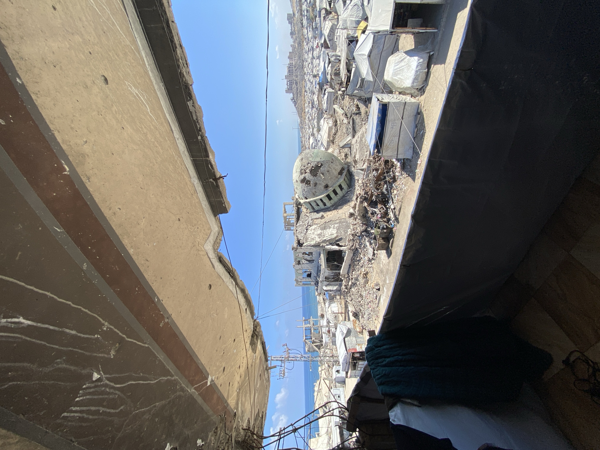 Daily life persists in damaged Gaza neighborhoods