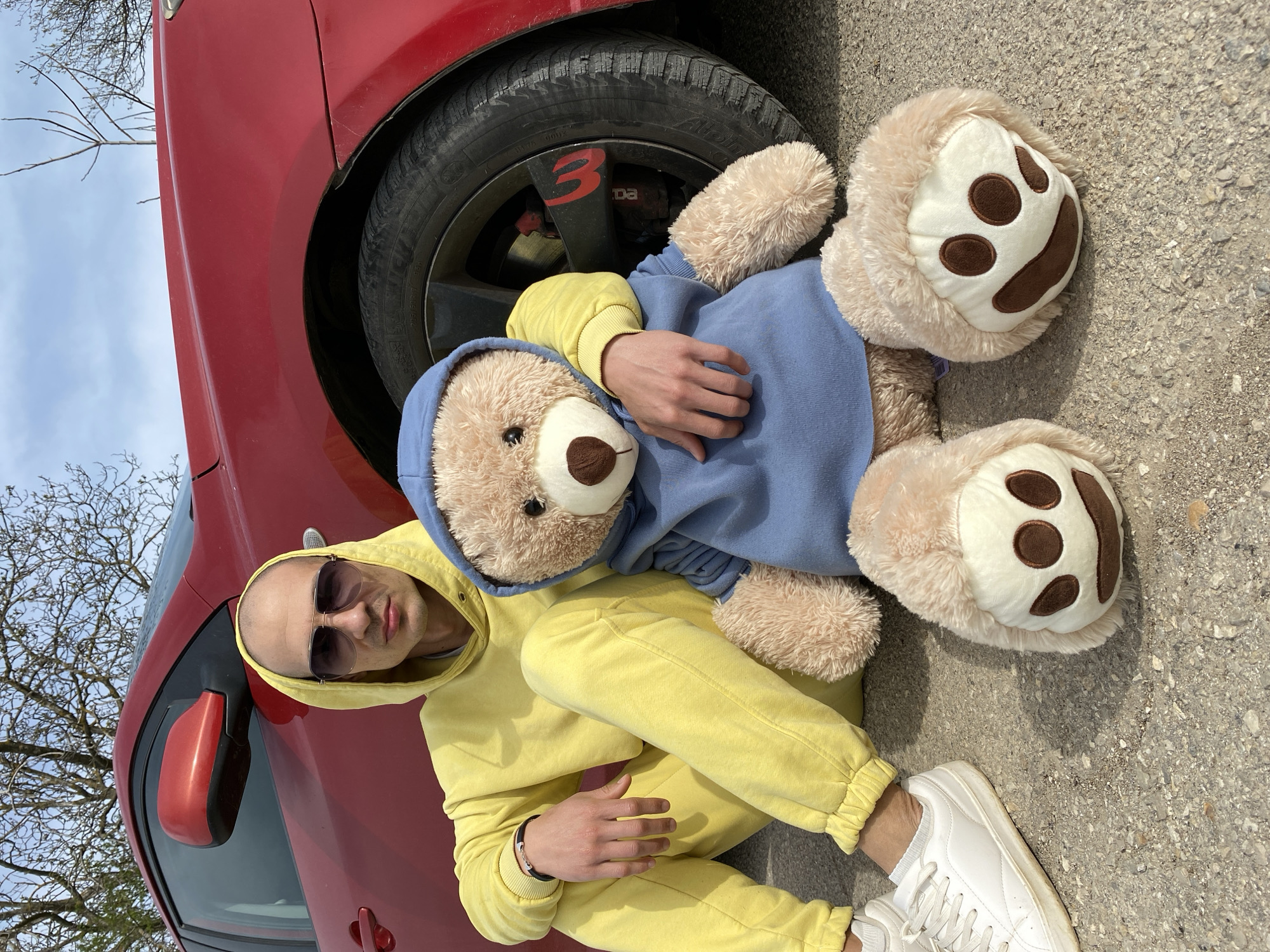Morning scenes captured in Pleven: man with teddy bear, blooming tree