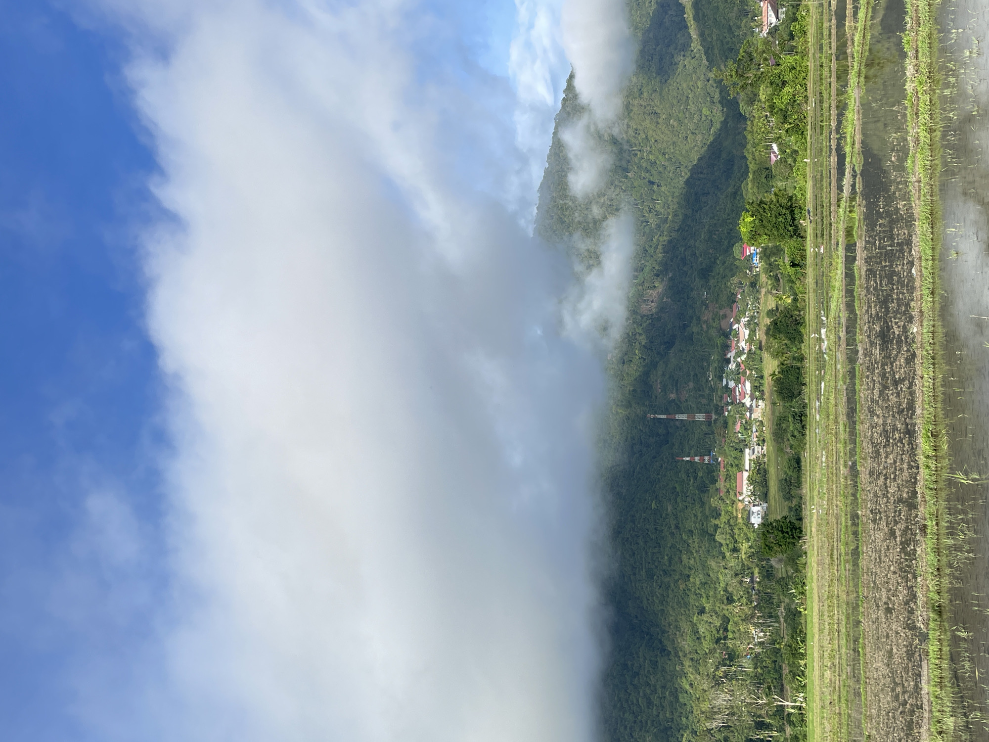 Drone views over flooded rice paddies in rural Uleegunong