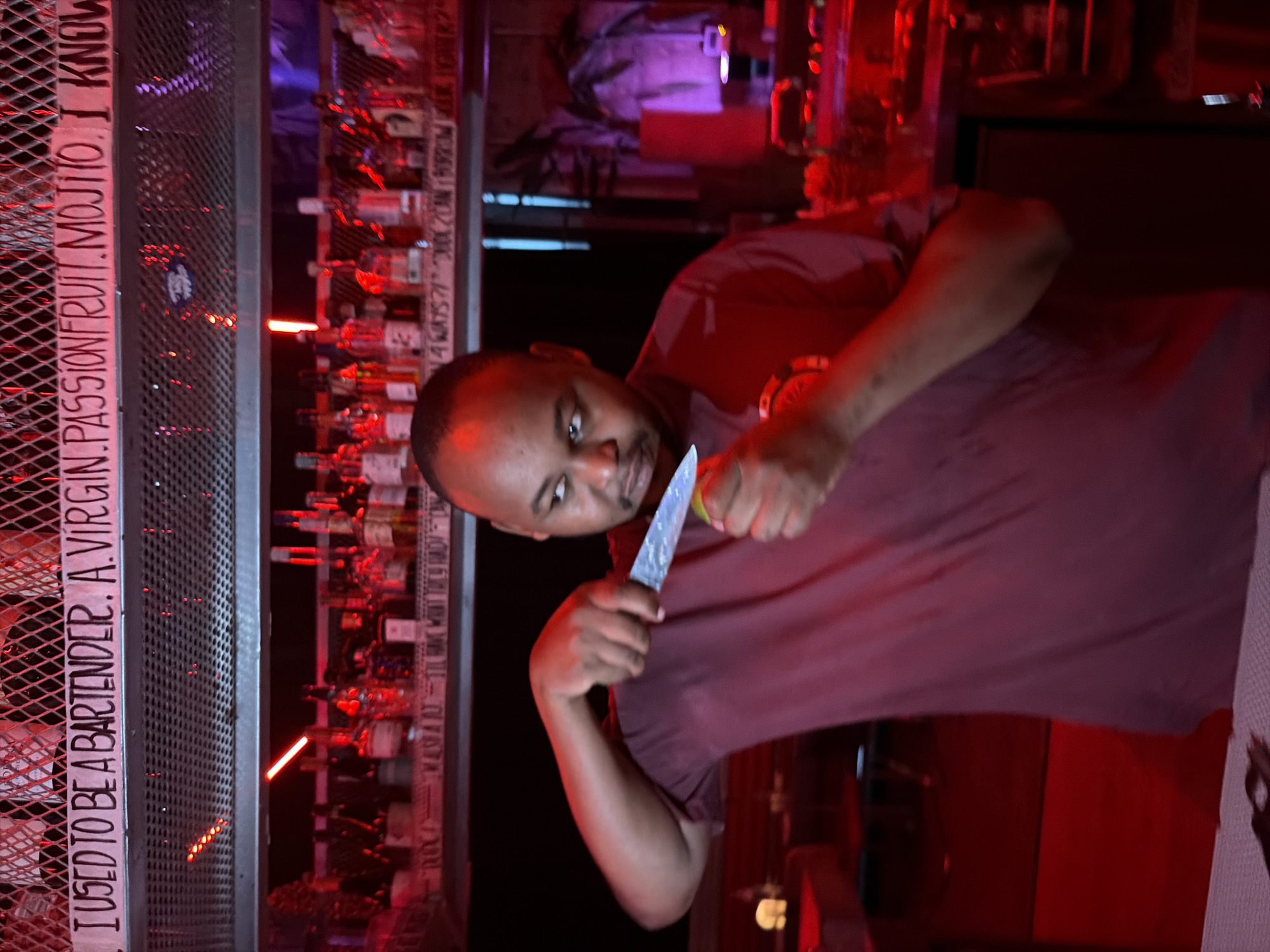 Bartender prepares drinks at Dubai establishment