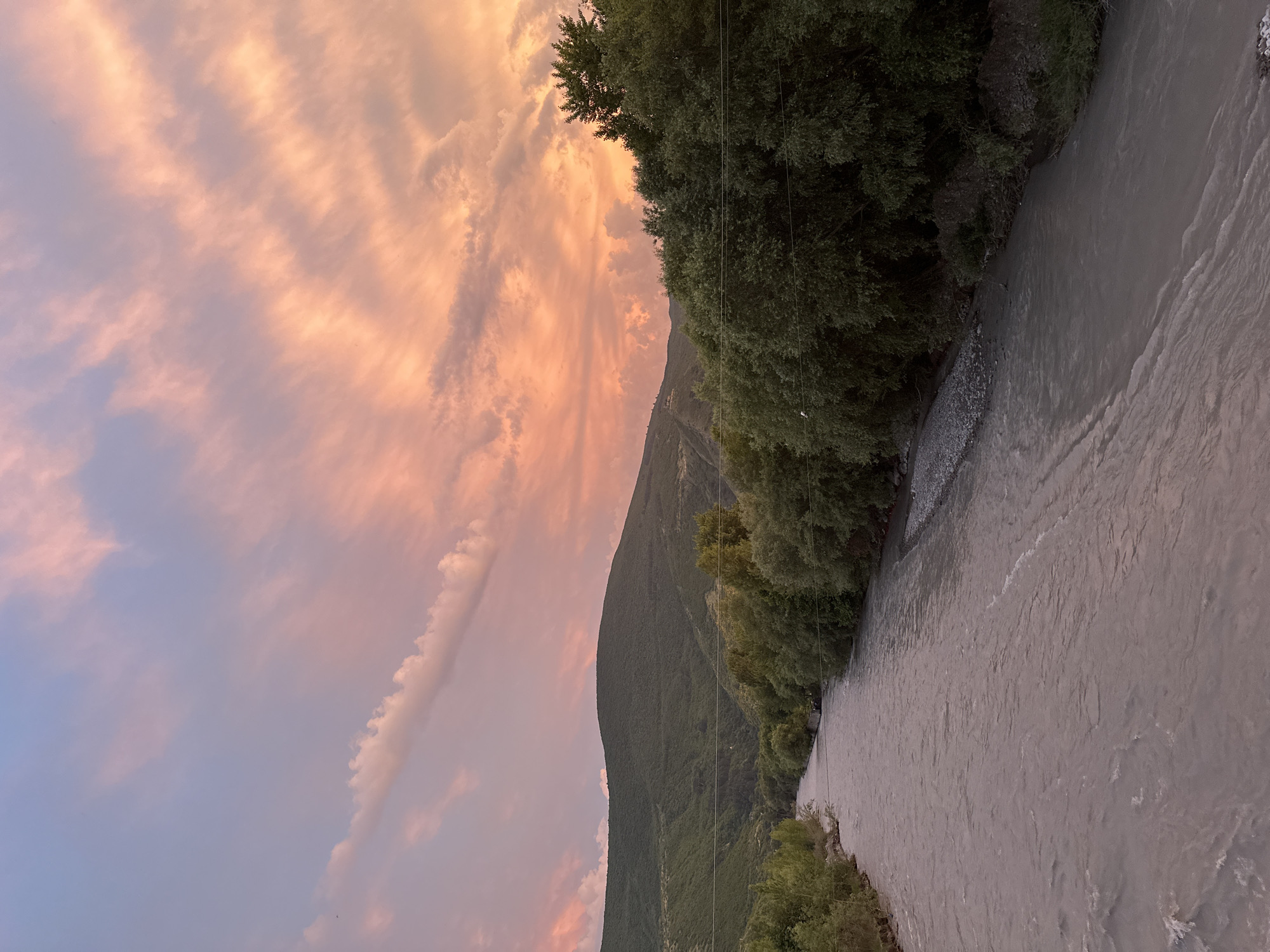 Sunset over Gori's rivers, forests, and mountain ridges