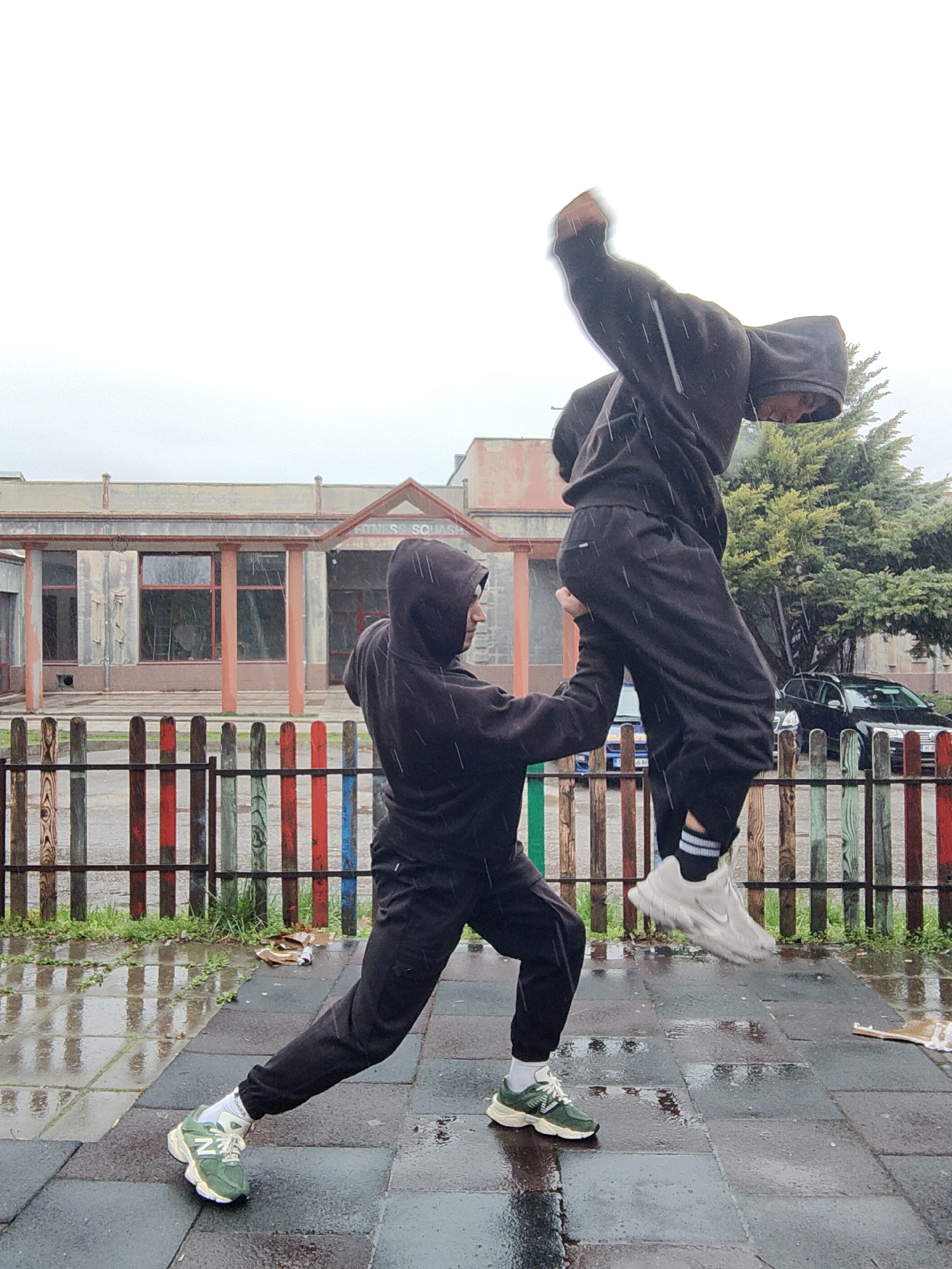 Parkour performers practice acrobatic moves in rainy Shumen, Bulgaria