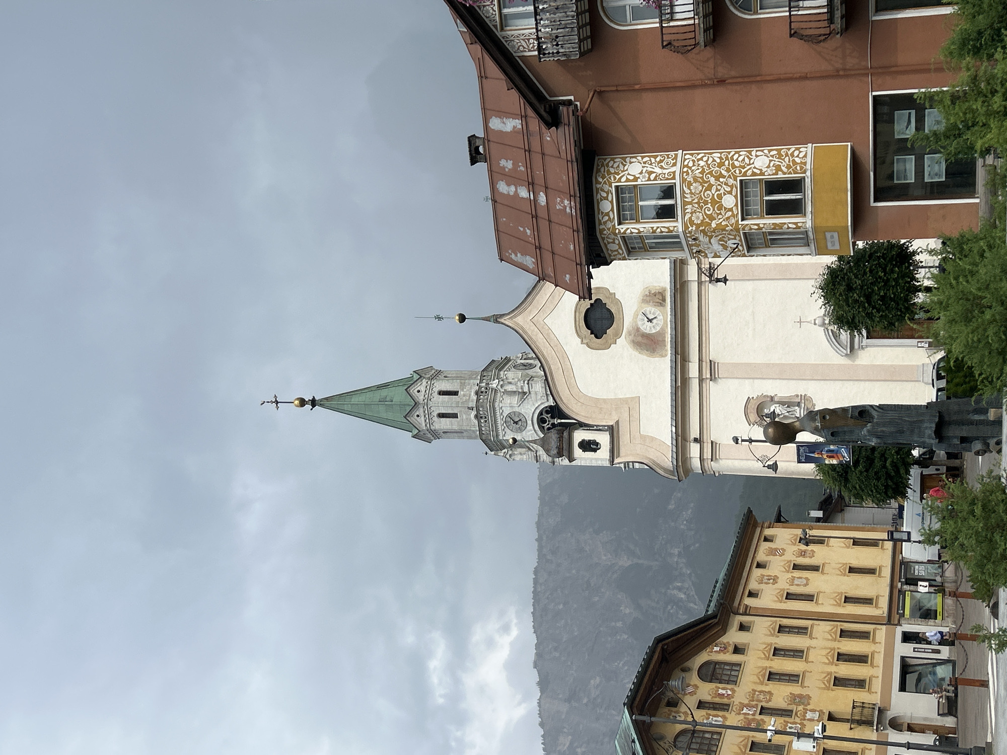 Alpine town buzz: streets, crowds, and Olympic rings