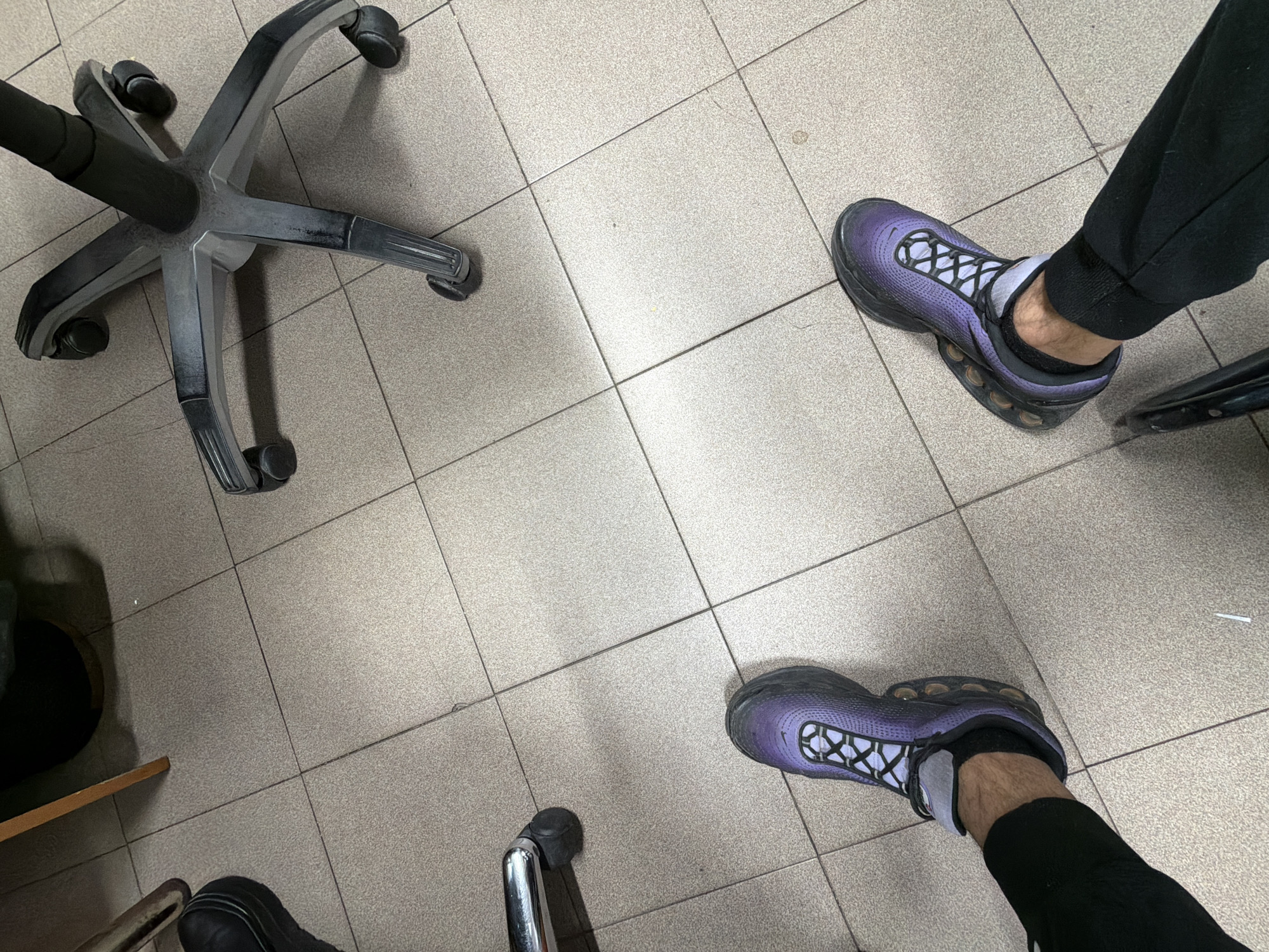 Person in sneakers observed indoors in Plovdiv, Bulgaria